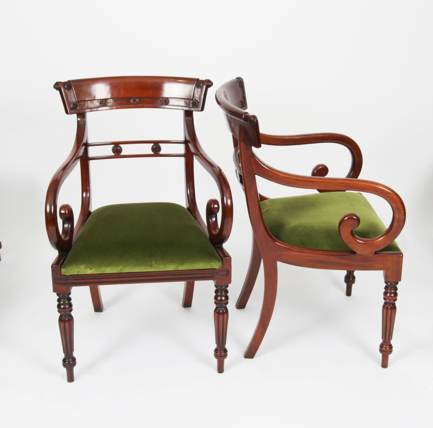 An absolutely fantastic Vintage set of twelve Regency Revival dining chairs dating from the late 20th Century.

These chairs have been masterfully crafted in beautiful solid flame mahogany throughout and the finish and attention to detail on display