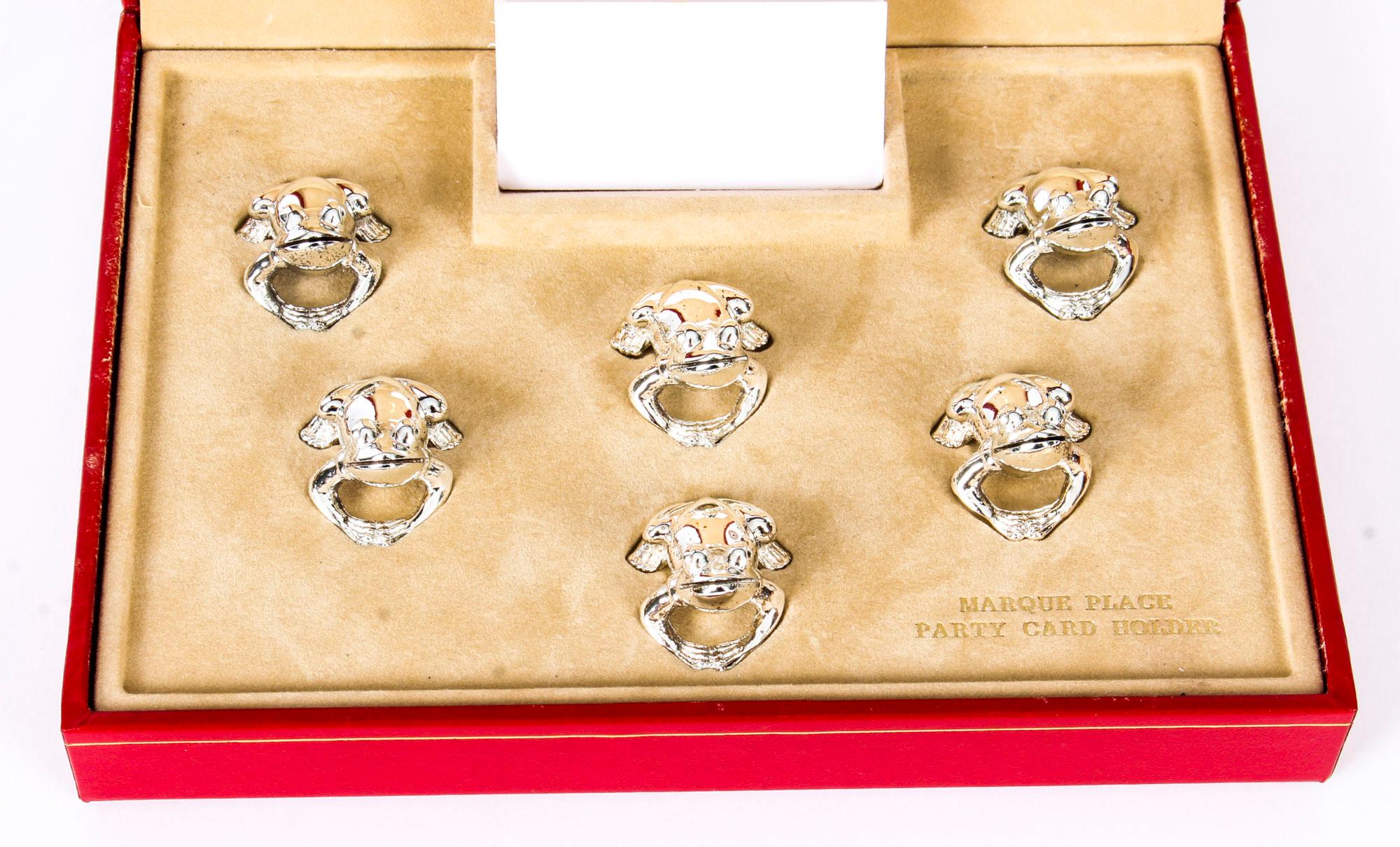 This is a truly splendid silver plated set of sex menu or party place card holders by the Parisian firm, Saint Hilaire, late 20th century in date.
 
These novelty menu holders feature an adorable seated frog, with its eyes looking upwards ready to