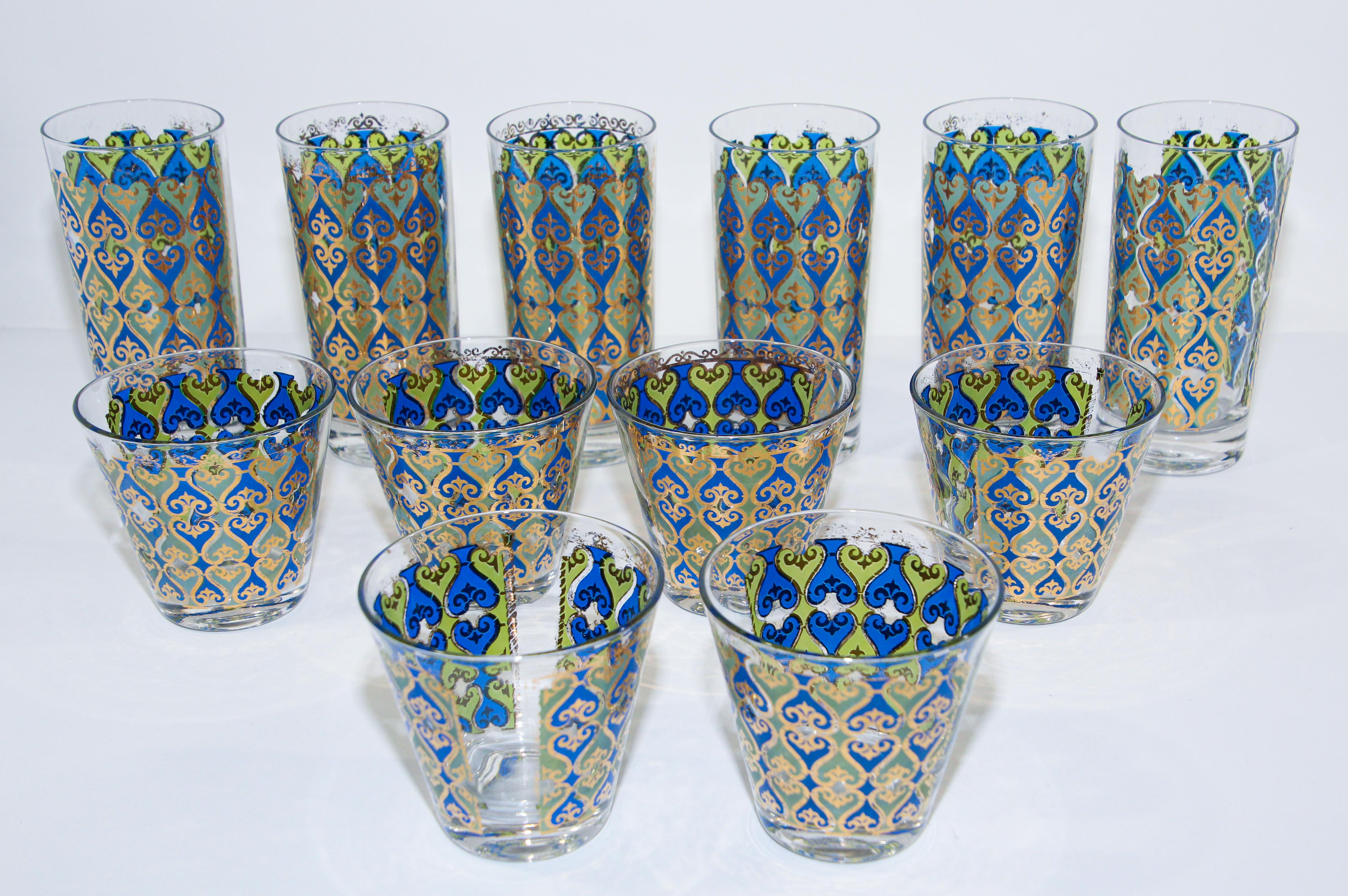 Elegant exquisite vintage set of 12 barware glasses designed by Georges Briard.
The glasses are decorated with gold leaf and Moroccan blue designs.
Vintage condition, with 22-karat gold leaf Moorish design.
Fantastic mid century vintage glasses