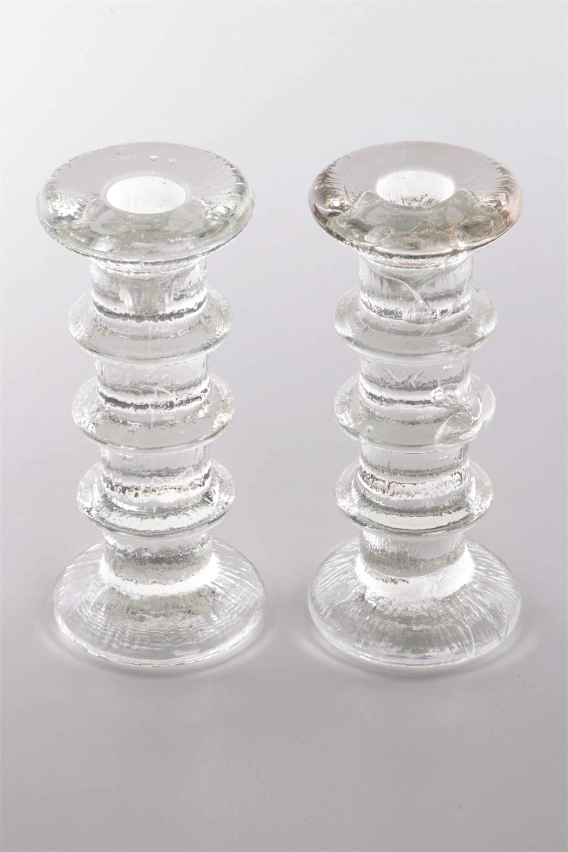 Vintage set of 2 glass candlesticks Design by Staffan Gellerstedt 1960s


A beautiful set of 2 glass candlesticks from Scandinavia: candlestick/candle holder with multiple rings design by Staffan Gellerstedt made by Pukeberg 1966.

This large