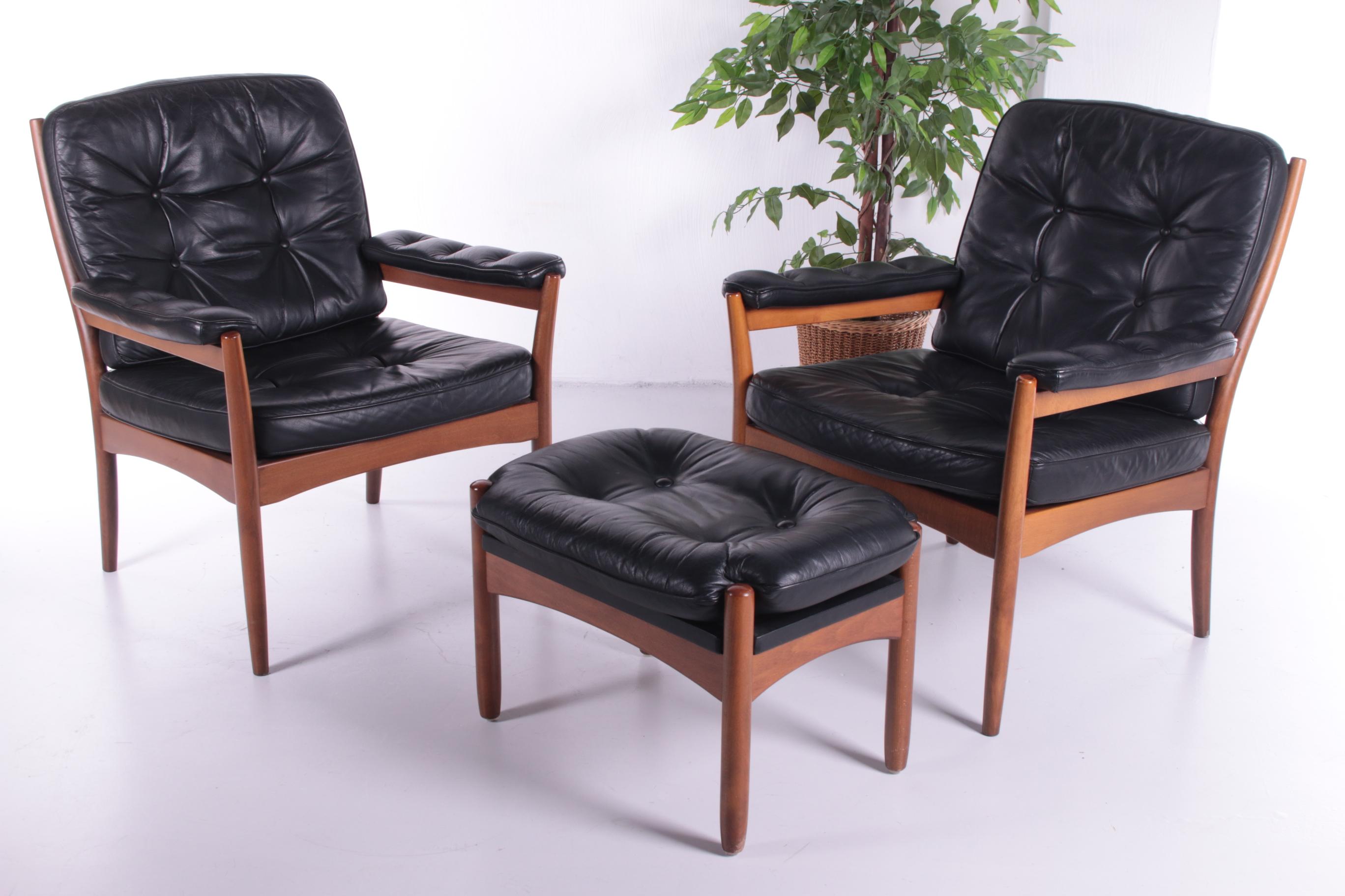 Vintage set of 2 lounge chairs by Gote Mobler Nassjo, Sweden, 1970s.


Beautiful set of 2 lounge chairs with ottoman. Made of wood with leather upholstery.

These chairs are still in top condition, beautifully finished with buttons that are all