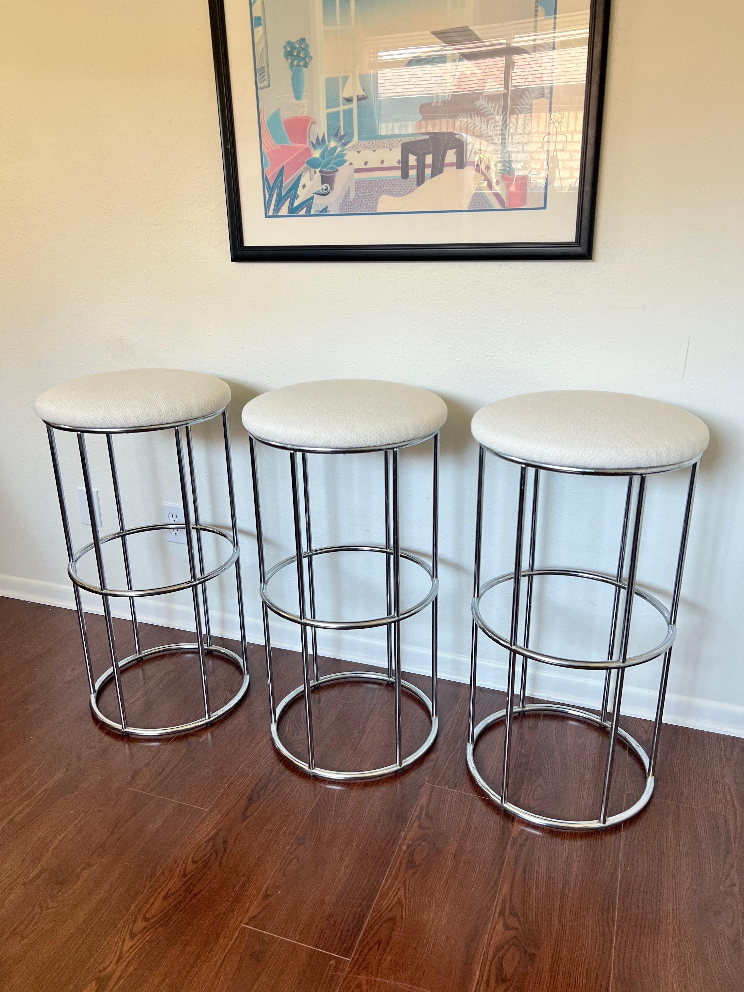 Mid-Century Modern Vintage set of 3 chrome barstools newly reupholstered in an ivory boucle fabric For Sale