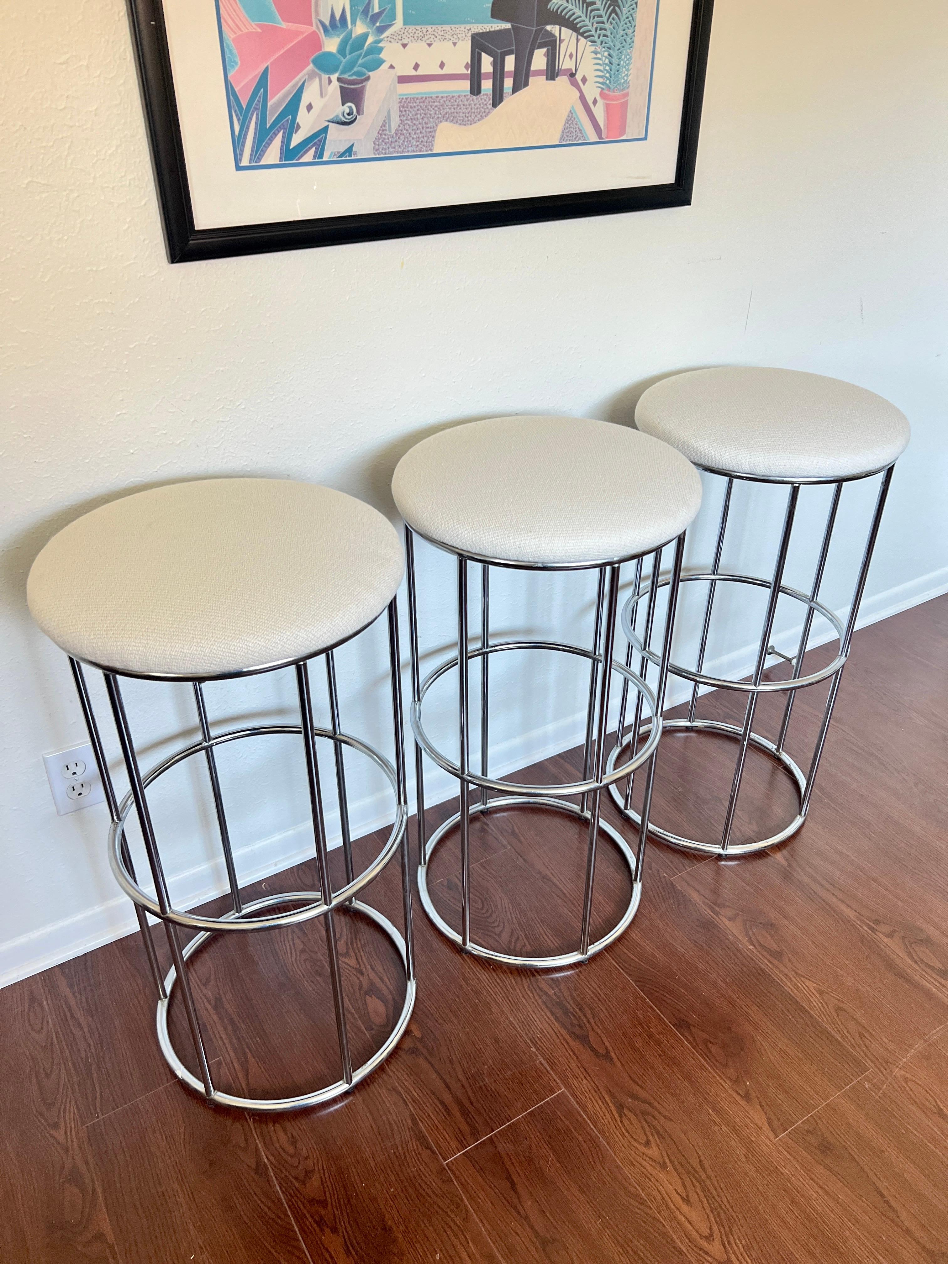 Late 20th Century Vintage set of 3 chrome barstools newly reupholstered in an ivory boucle fabric For Sale