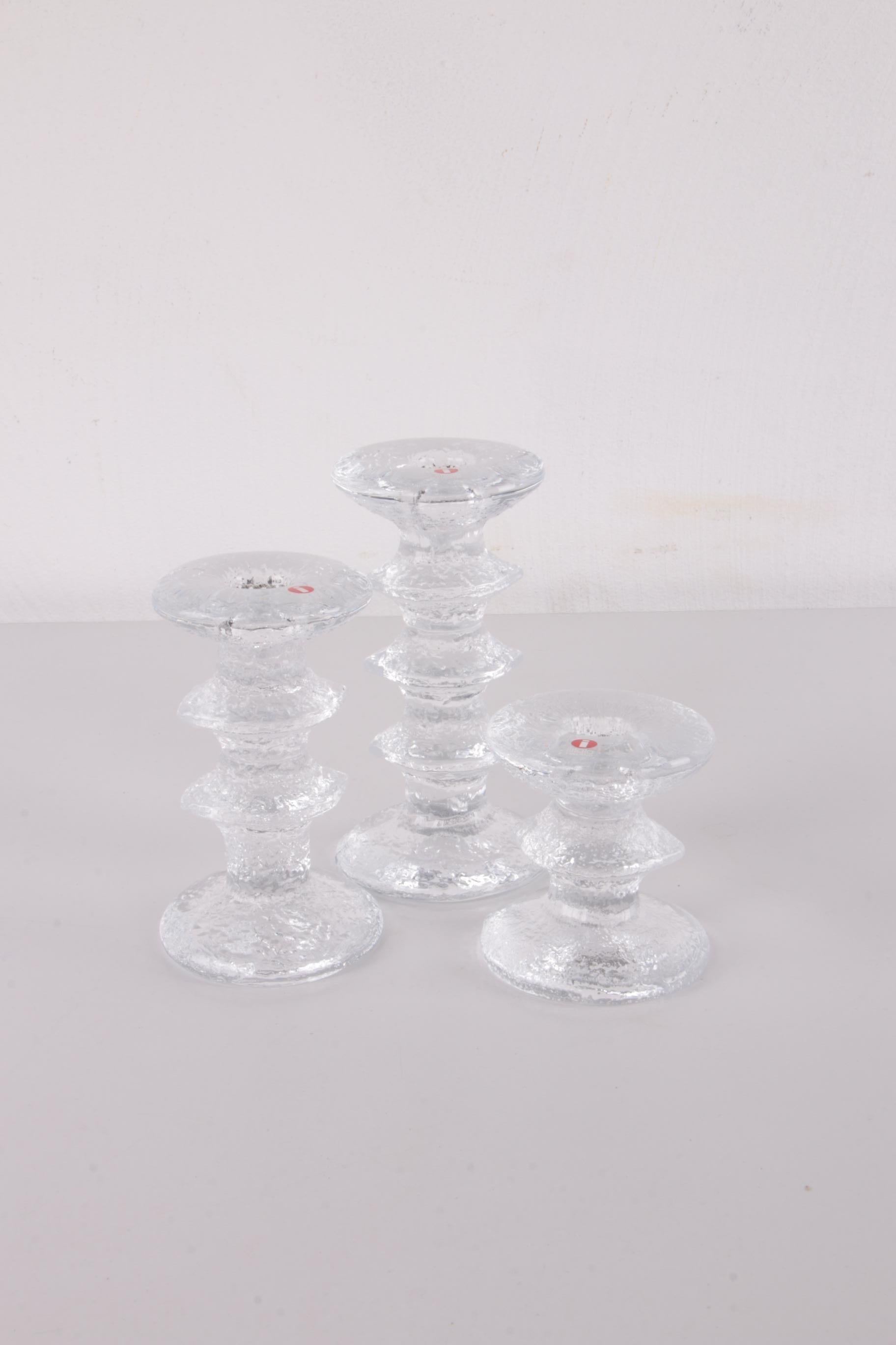 Vintage Set of 3 iittala glass candlesticks Design by Timo Sarpaneva 1960s


A beautiful set of 3 glass candlesticks from Scandinavia: signed Iittala festivo candlestick/candle holder with multiple rings design by Timo Sarpaneva from