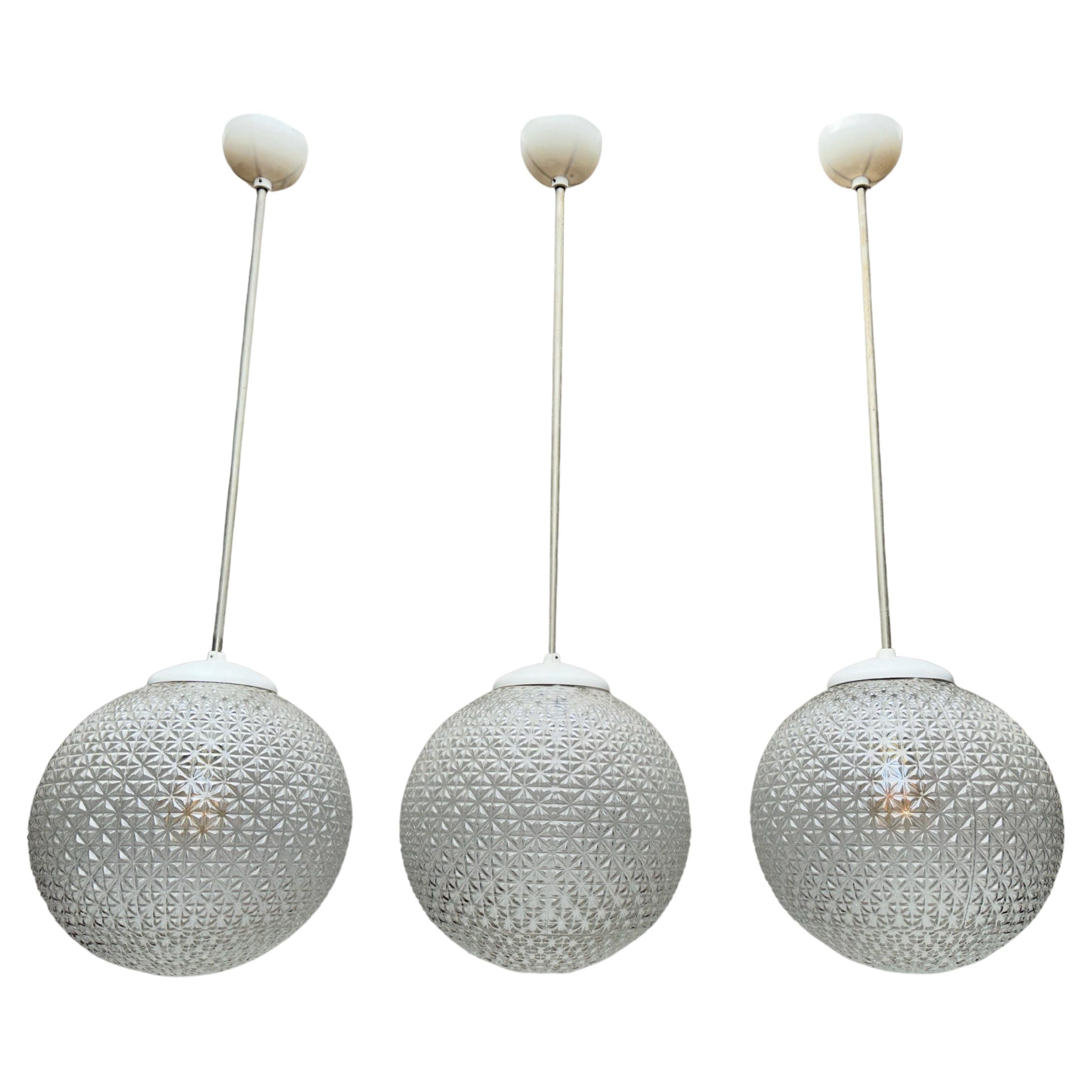 Vintage Set of 3 Mid-Century Modern Pressed Glass Pendant Lights, 11 Available For Sale