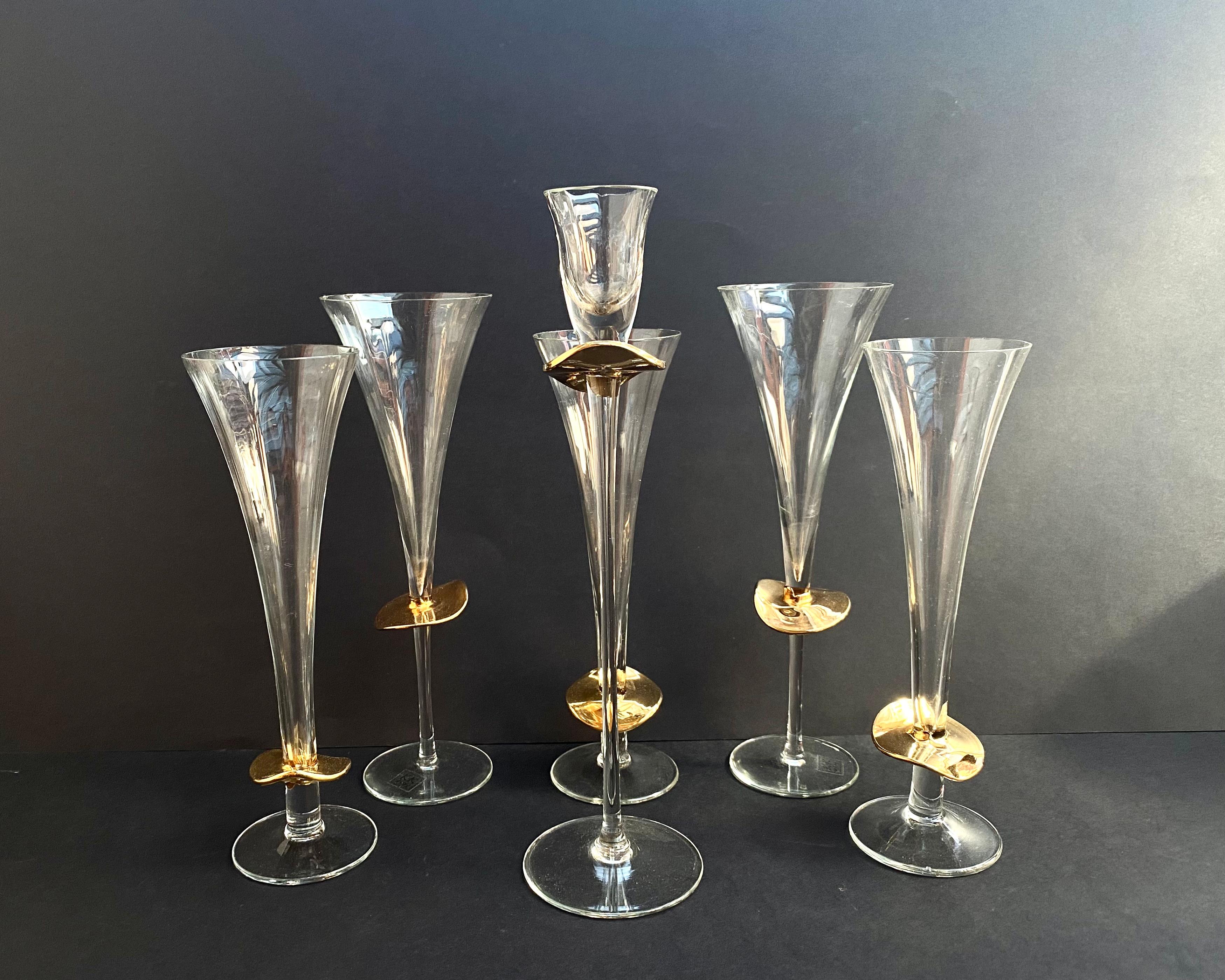Gorgeous Rare Set of Crystal Glasses and Candlestick with 24k gold by German manufactory K&K Styling.

Products are equipped with high legs and are designed to serve champagne, wine, cognac or other liquids.

The glasses are hand-cut and munge