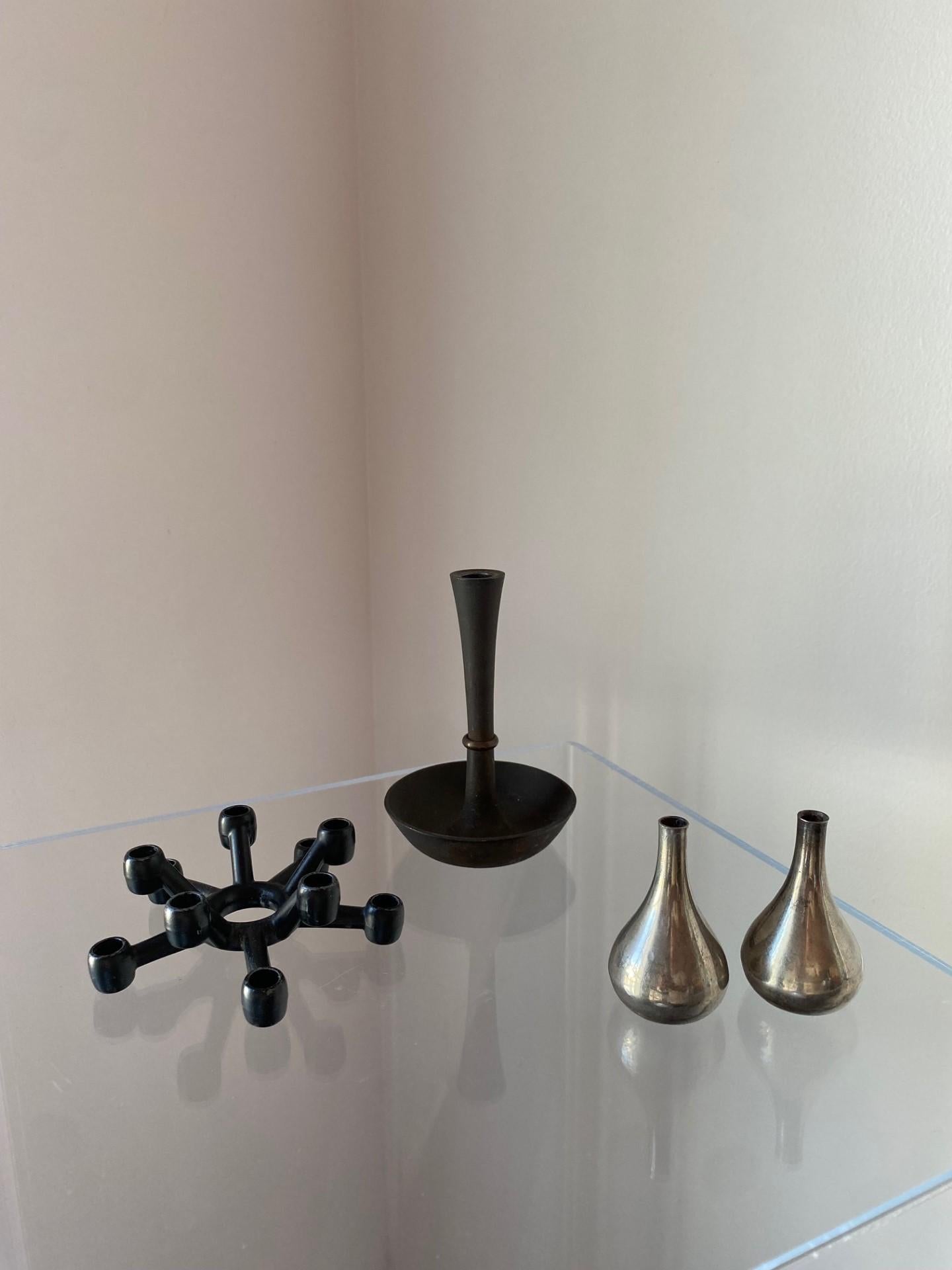 An array of incredible Scandinavian classic candle holders from Dansk.  This set includes a spider candle holder, an Iron and Brass candle holder and two teardrop candle holders (4 pieces total). Incredible designs from Dansk and Jens