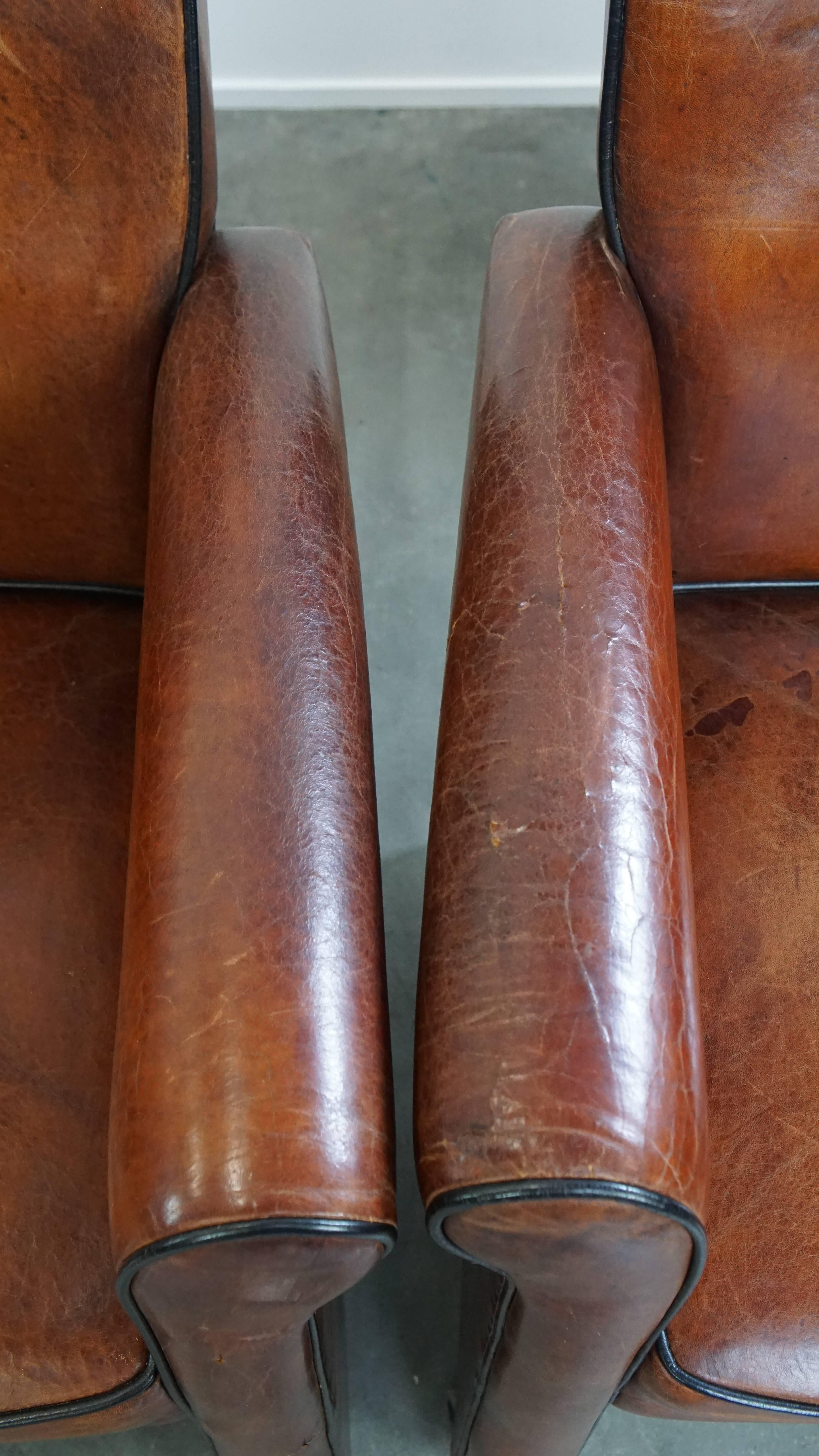Vintage set of 4 sheepskin leather dining chairs on castors en vente 6