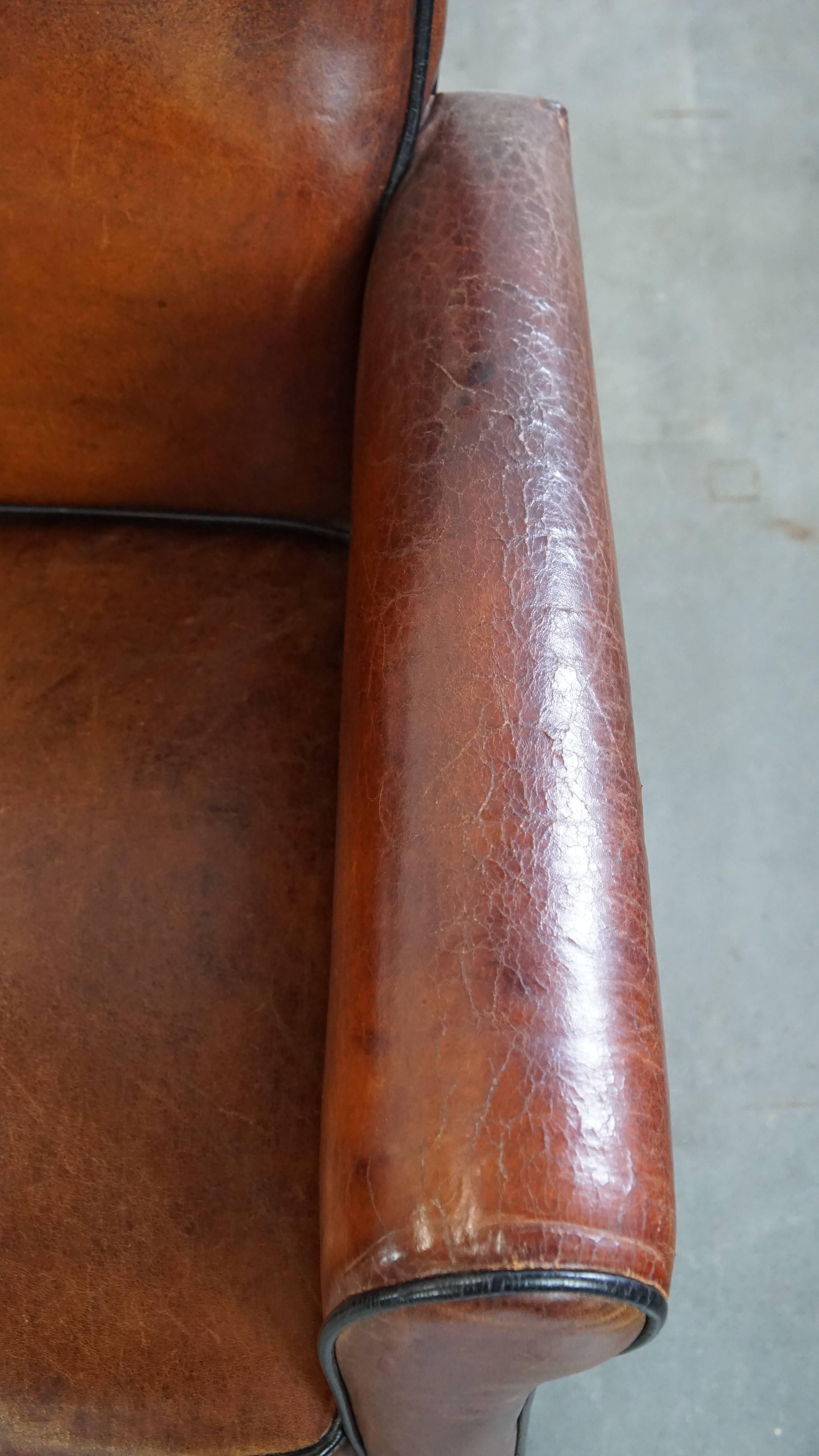 Vintage set of 4 sheepskin leather dining chairs on castors en vente 7