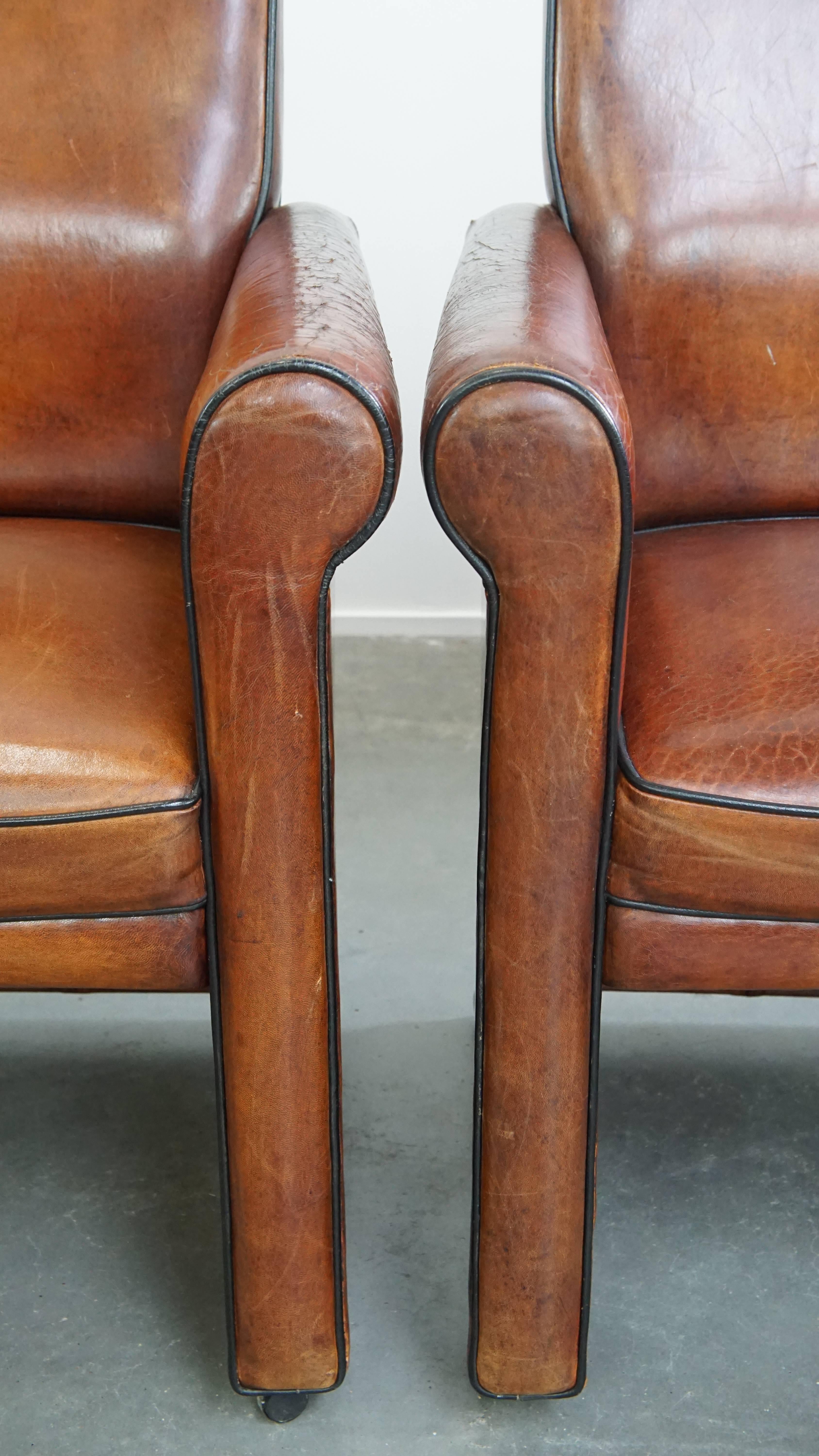 Vintage set of 4 sheepskin leather dining chairs on castors en vente 8
