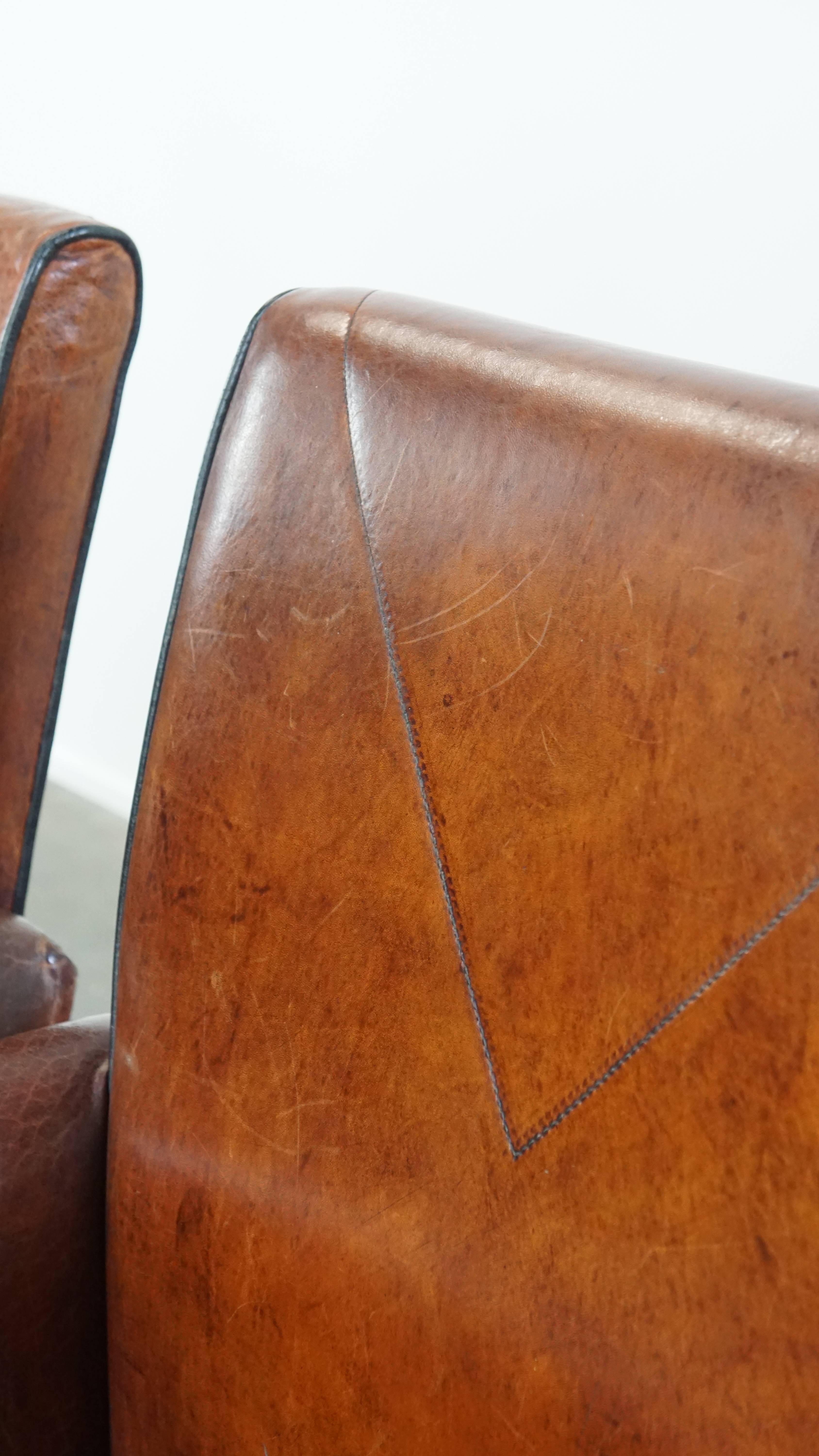 Vintage set of 4 sheepskin leather dining chairs on castors en vente 11