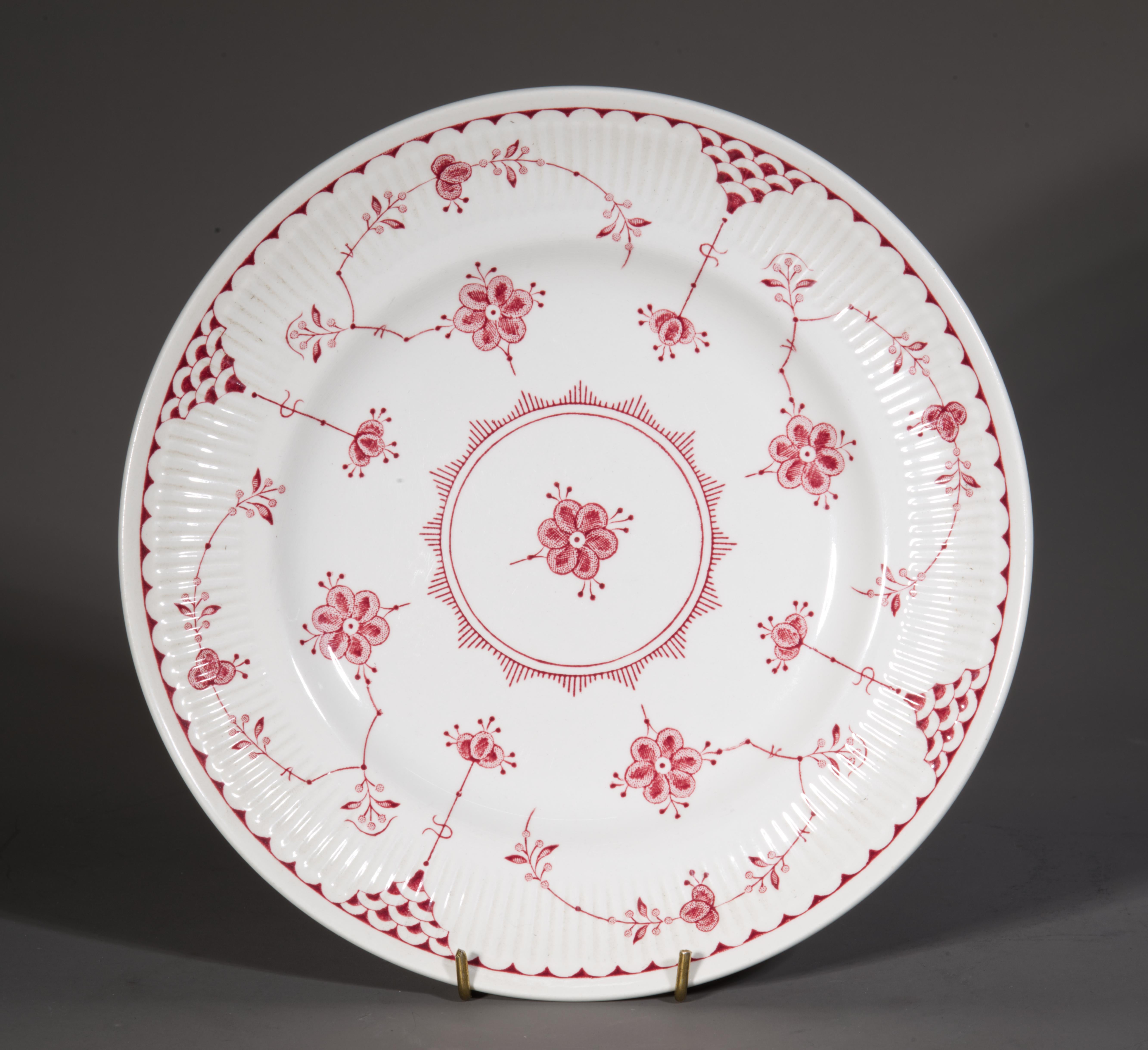 Set of vintage 6 salad or dessert plates is decorated in the Denmark pattern in the unusual red or pink colorway. Usually the Denmark pattern is synonymous with blue and white colors, but the red and green variants were produced for a short time,