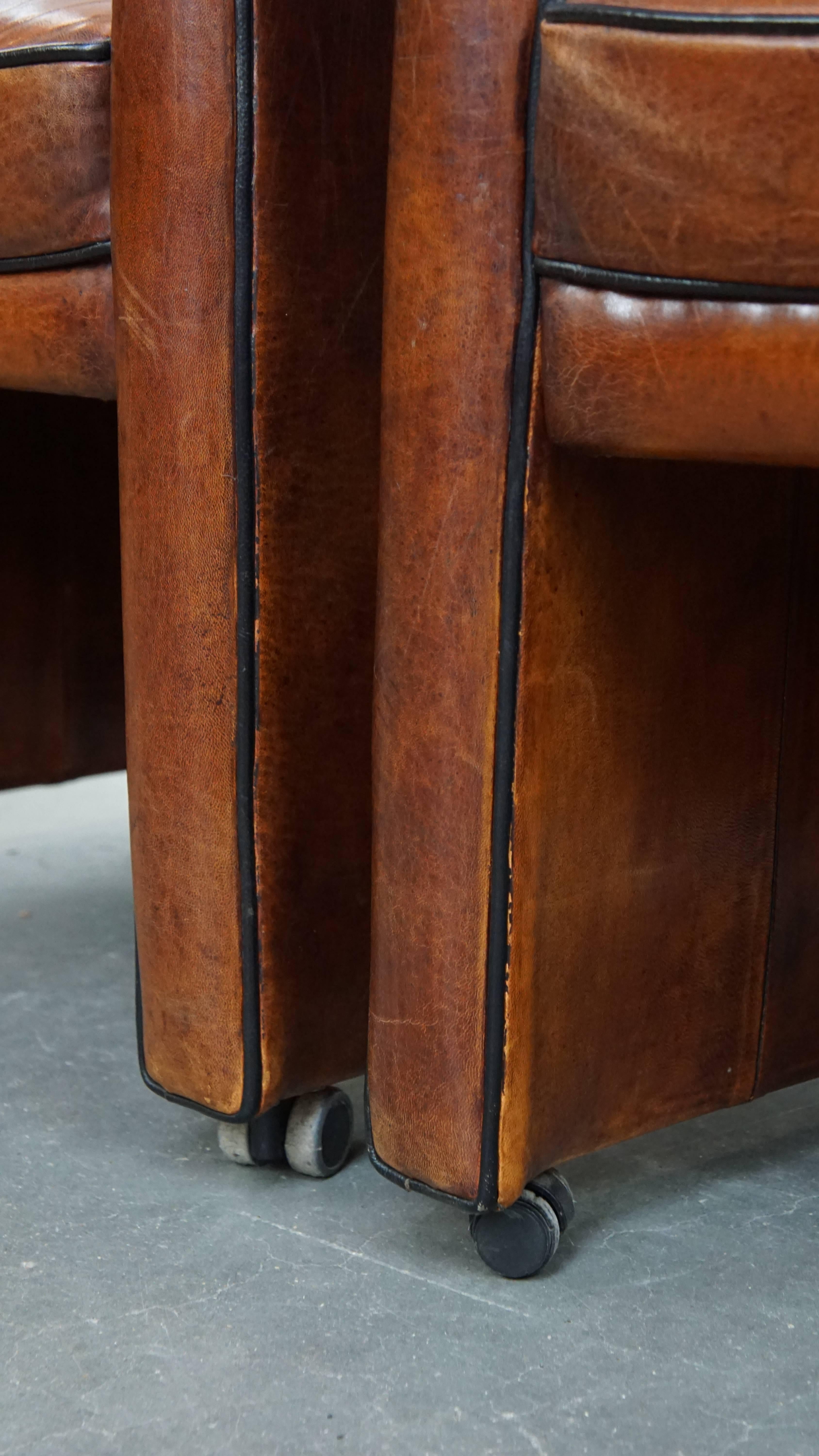 Vintage set of 6 sheepskin leather dining chairs on Wheels im Angebot 6