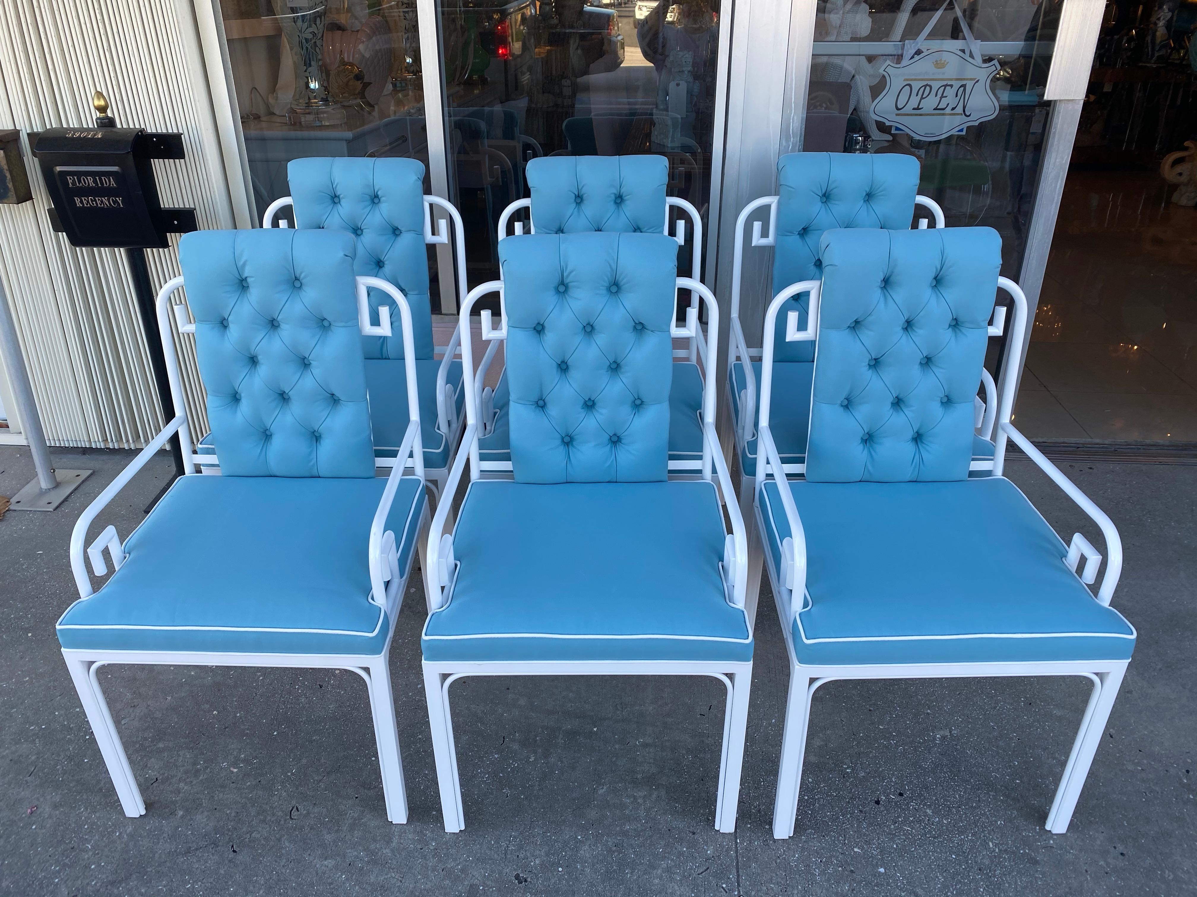 Vintage set of 6 Mastercraft Greek key arm dining chairs. These have been professionally restored from top to bottom. These can be used indoors or on a patio or porch. The set has been professionally powder-coated in a fresh white. The cushions and