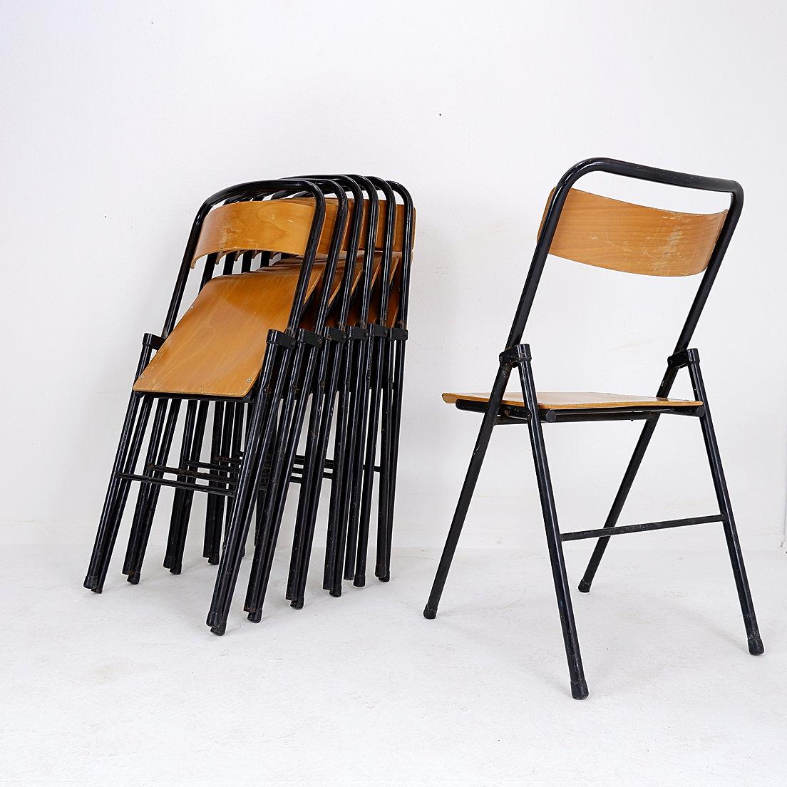 Vintage Set of 7 folding chair in metal and wood - 1960s
Industrial - Vintage - Chairs
Measures : 43cmx46cm H:83cm SH:44cm 
Materials : Metal 
Wear consistent with age and use : Please see photos 