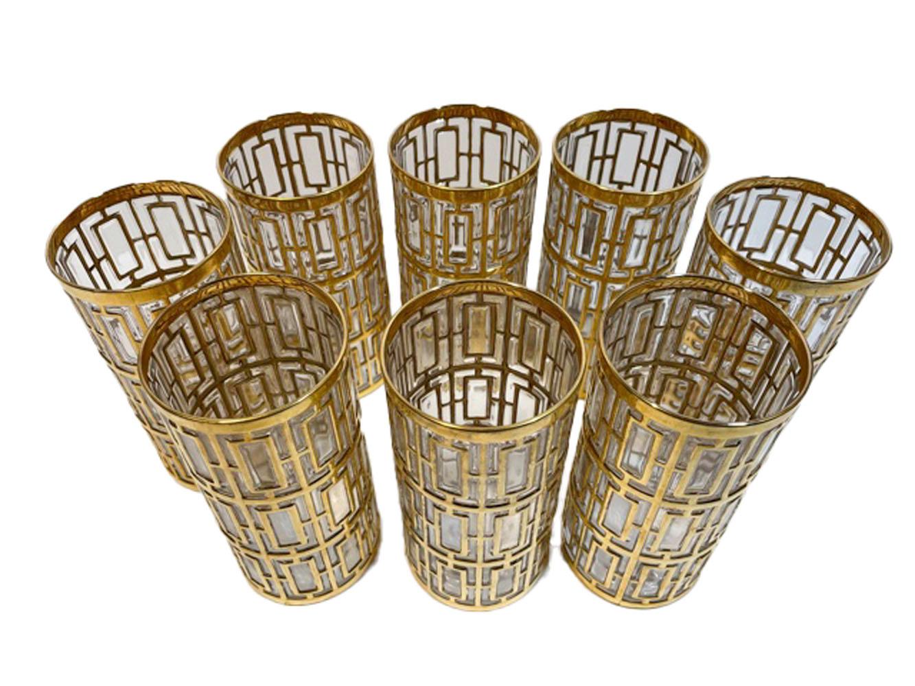 Set of 8 (2 sets available) mid-century modern highball glasses made by Imperial Glass Co. in the Shoji Pattern. Each piece is molded with a raised pattern inspired by Japanese Shoji screens, the raised areas are then gilded in 22k gold.