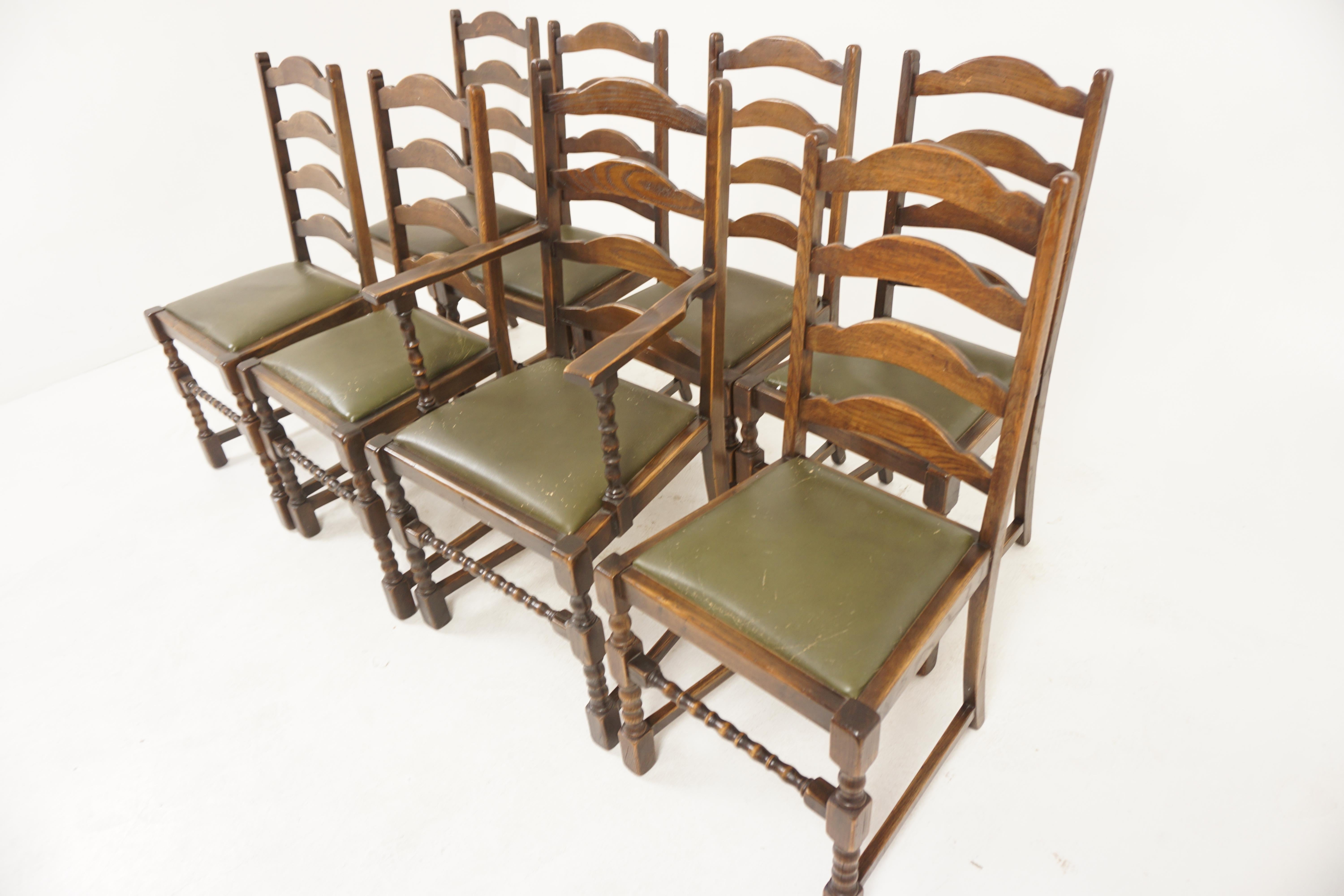Vintage Set Of 8 Oak Ladder Back Dining Chairs, Scotland 1930, H1175

Solid Oak
Original Finish
The chairs have a four rung high ladder back with shaped top supports
Lift out upholstered vinyl seat 
Standing on turned legs with a bobbin front
