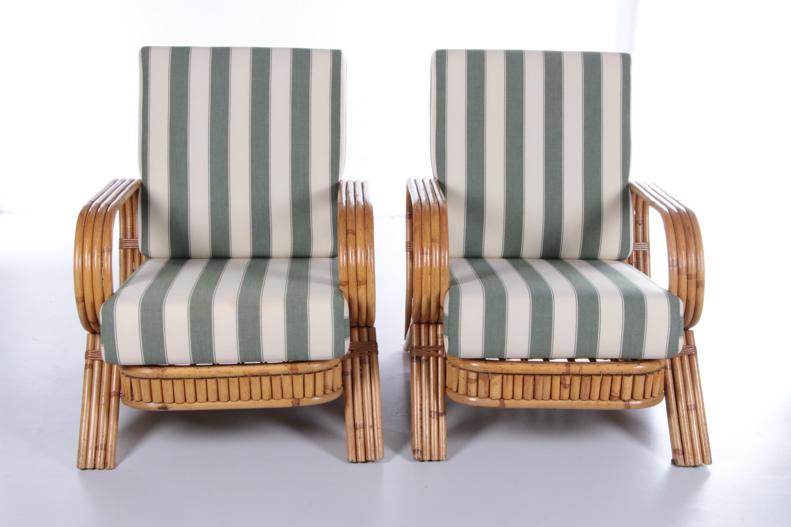 This beautiful set of bamboo armchairs is by Paul Frankl. The chairs were produced in France around the 1960s.

The chairs have a solid bamboo frame. The cushions feature the original green and cream striped fabric. 

The combination of the colours