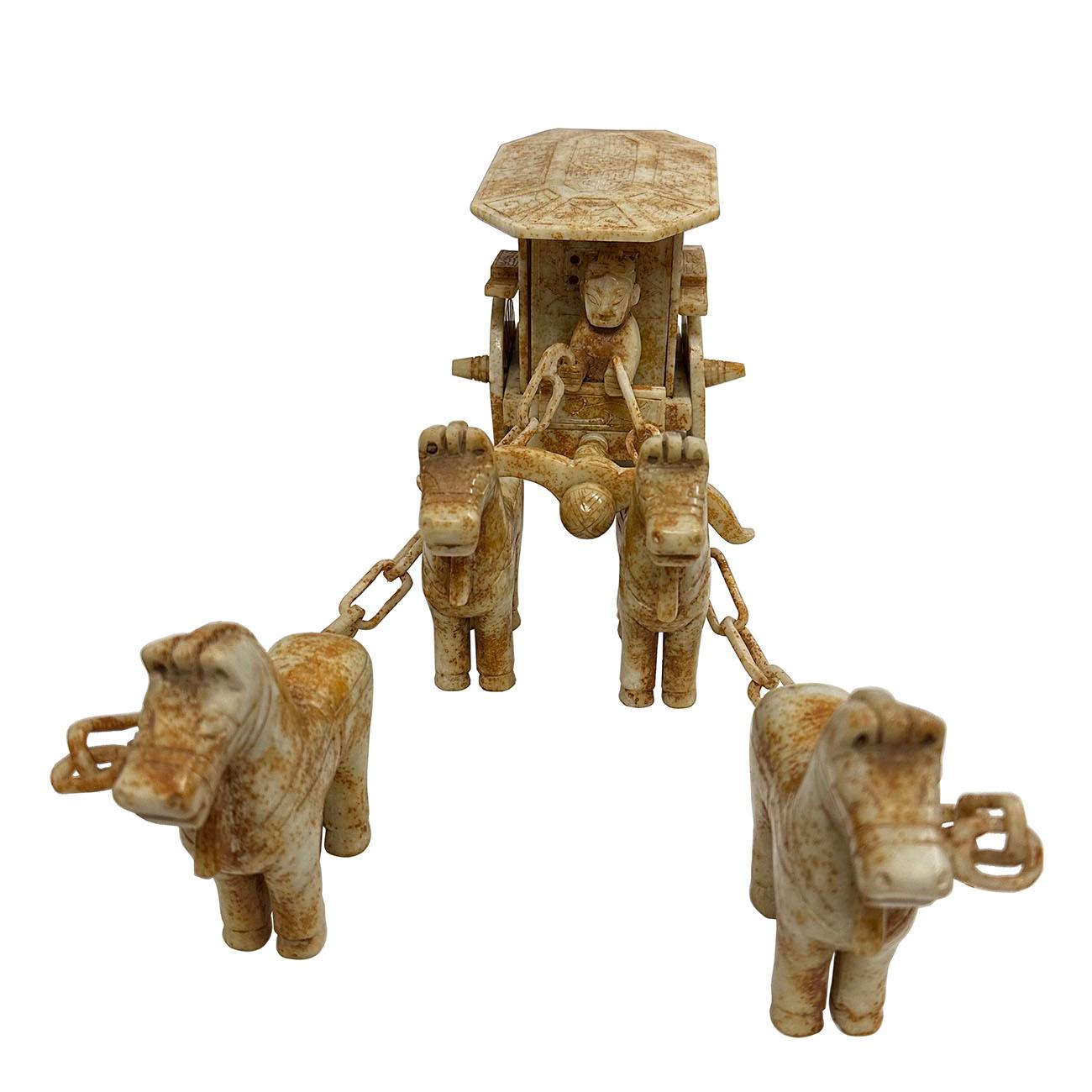 This set of Chinese Jade carved horse drawn carriage are hand crafted with exquisite detail. They were carved with a 