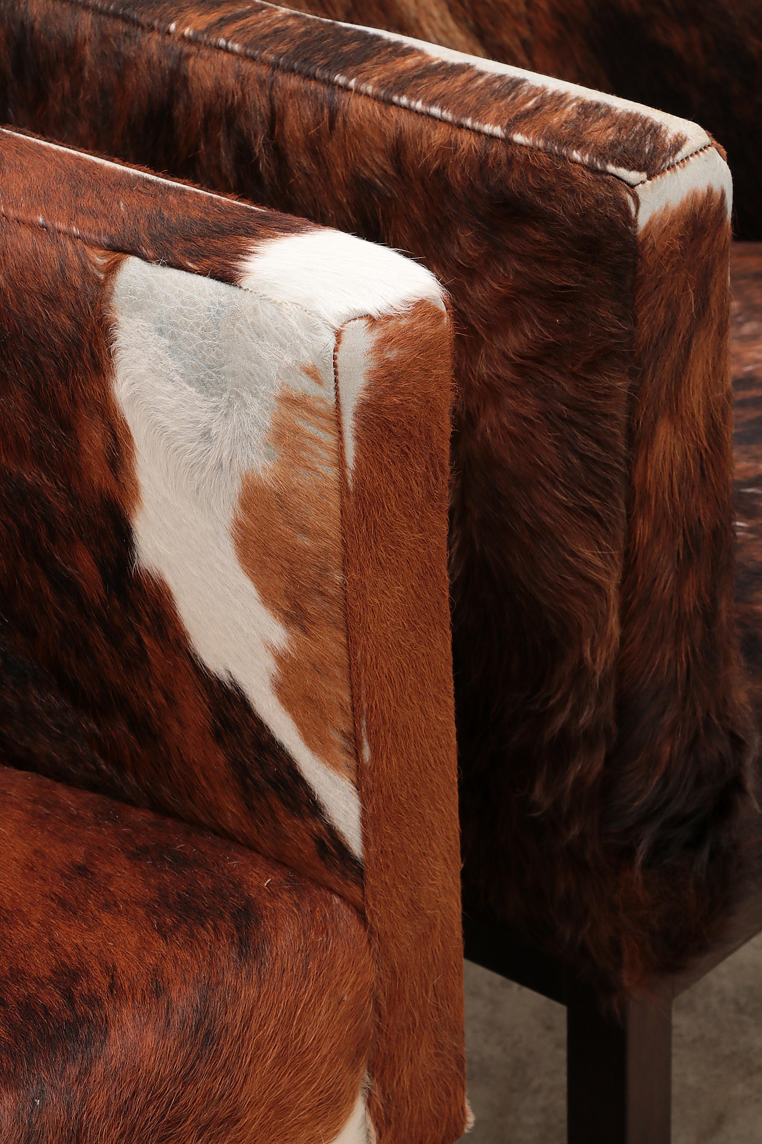 Vintage Set of Cowhide Armchairs, 1970 For Sale 7