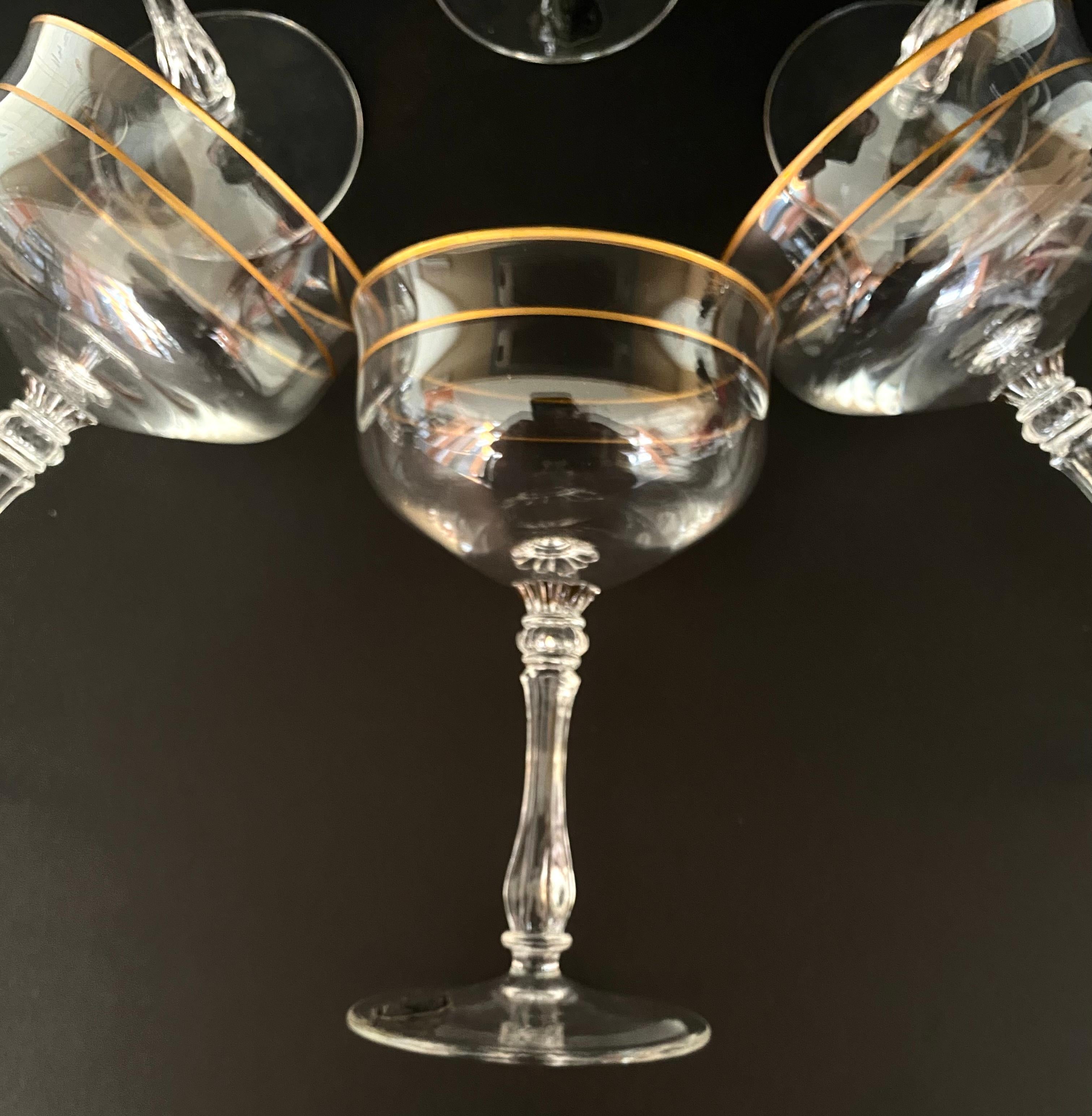 Beautiful vintage champagne glasses from the famous German factory Gallo, around 1970s, made of clear crystal with a golden border.

This set of 6 glasses has an elegant appearance and is perfect for serving a festive drink.

A set of champagne