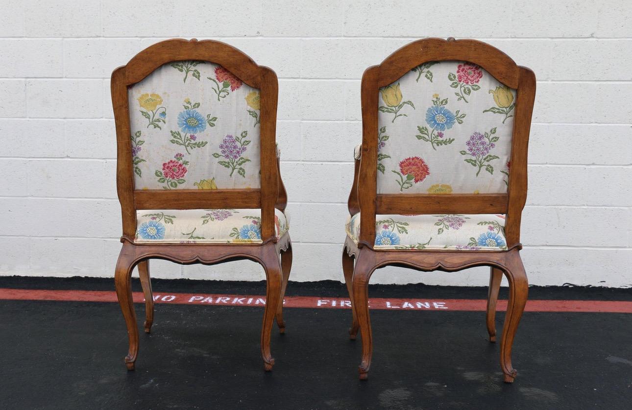 Wonderful set of eight dining armchairs from the 1960’s. They are in vintage condition. The wood frame is in good condition, none of them are damaged. They would probably need to be reupholstered. The fabric has some stains, (check it out in the
