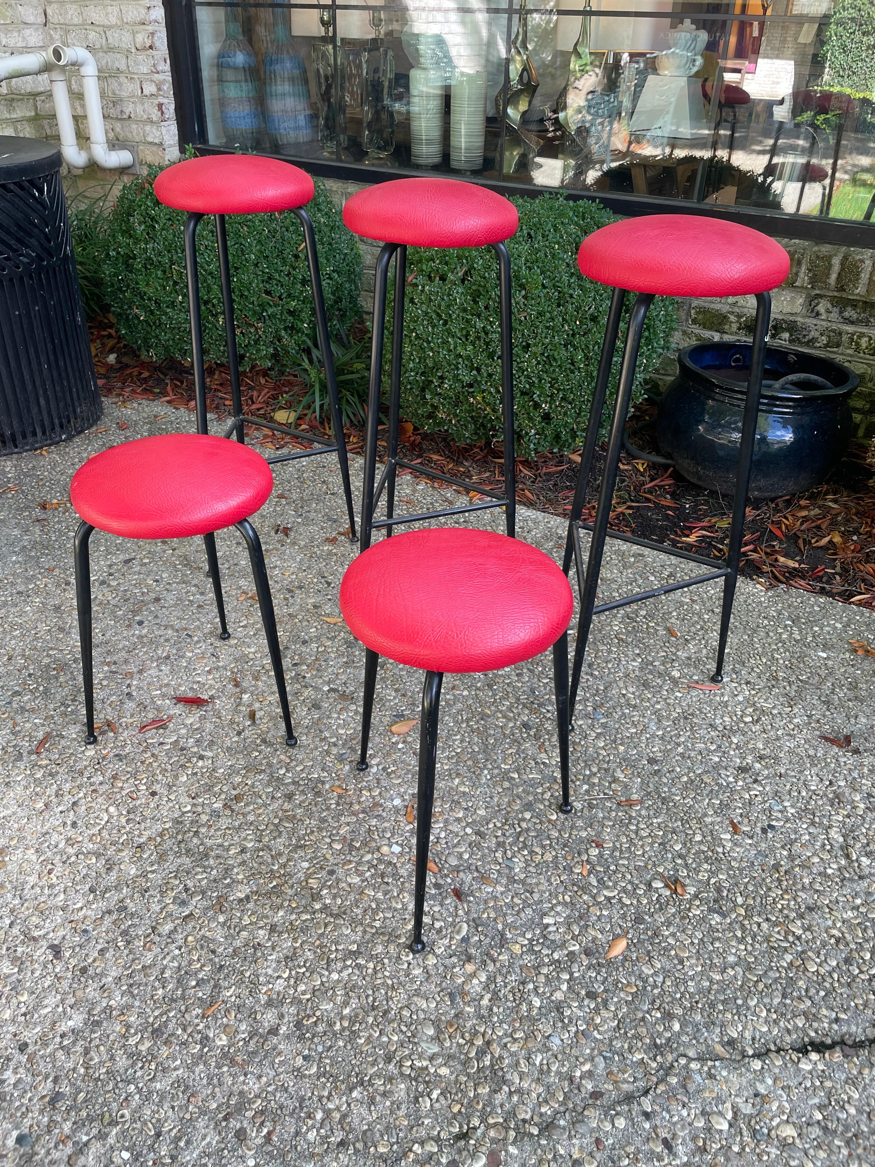 This is a vintage set of five stools in total, three (3) are bar height at 34