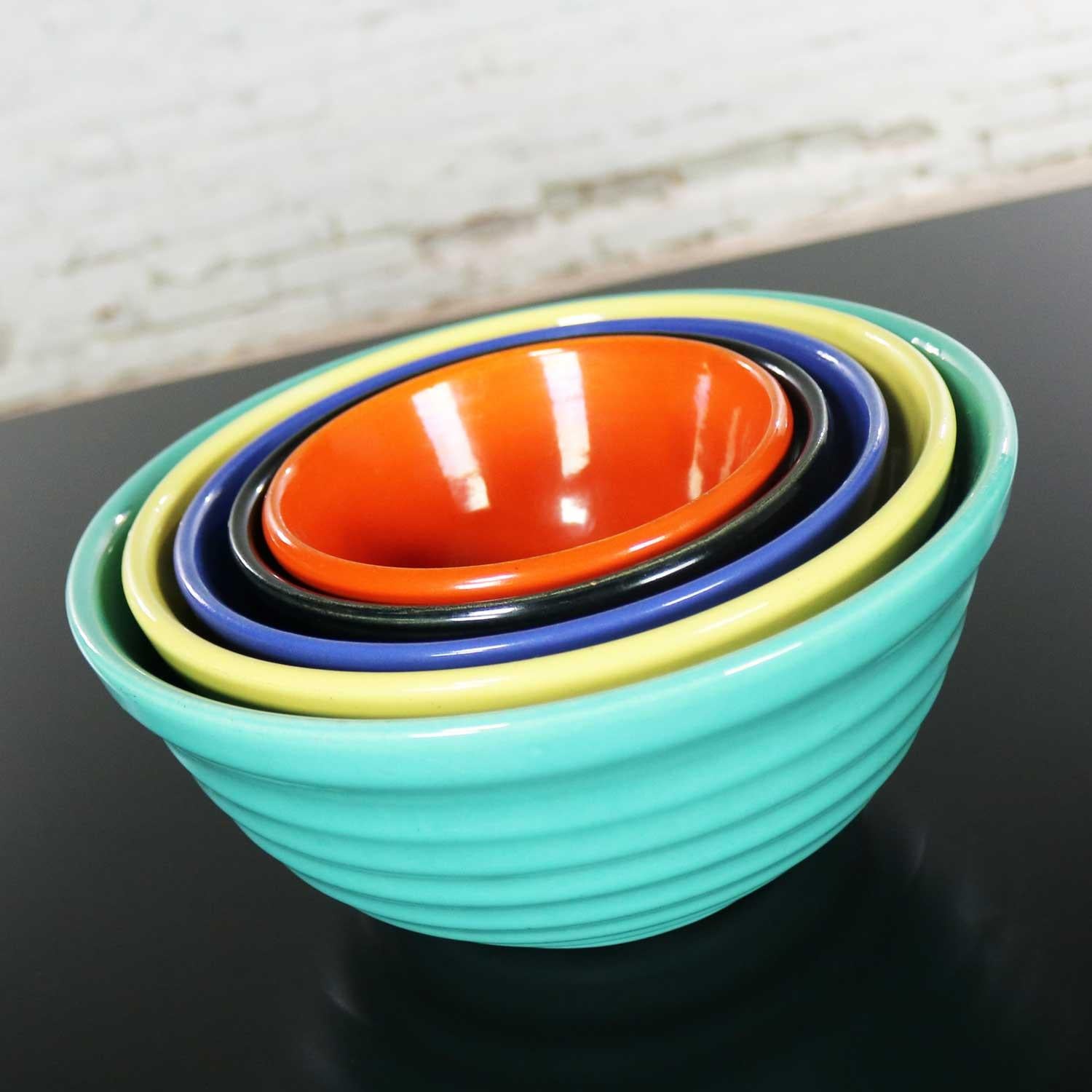 Handsome set of five multicolored Bauer Ringware nesting mixing bowls. They are numbered12, 18, 24, 30, and 36 and in five different colors. Their condition is very good with no chips, cracks, or chiggers. They do have come signs of use in the