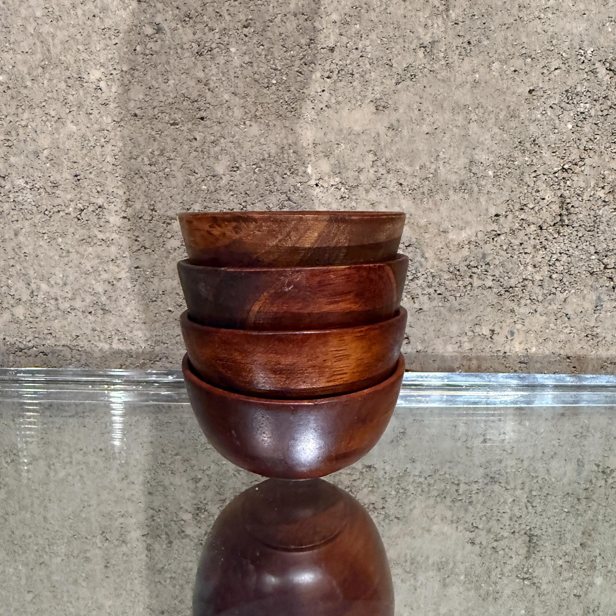 For your consideration, a vintage set of four (4) turned mini wood bowls. Unmarked, no information present from the maker. USA circa the 1980s.
 
Dimensions: 3.13