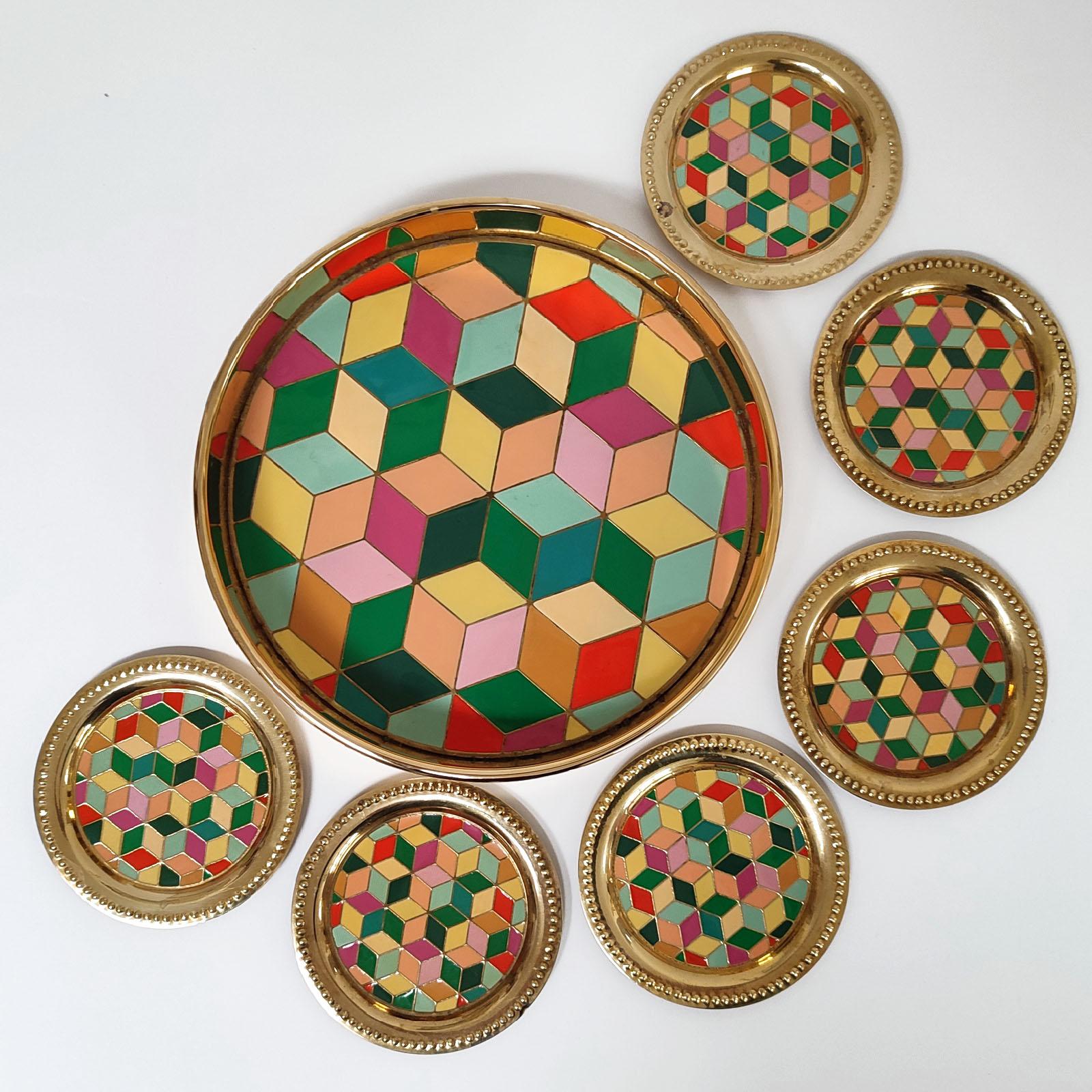 Vintage set of gilt metal and enamel round tray and six coasters, Sweden 1970s
Original label under the bottom.
In very good original condition, minor spots of oxidation to one coaster.
Measures: Tray diameter 24cm
Coaster diameter 11.5 cm.