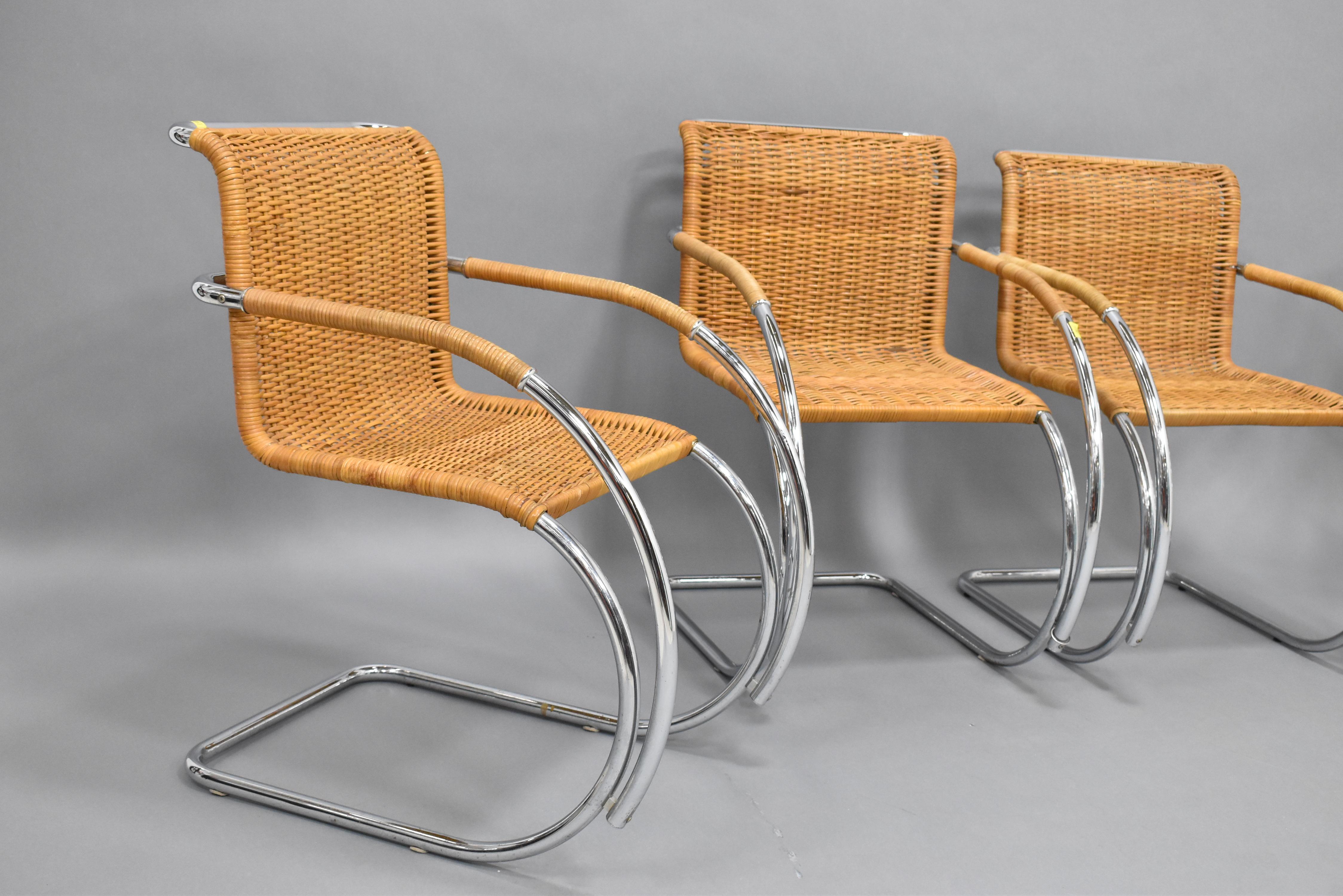 Beautiful set of (4) Mies Van Der Rohe MR20 armchairs. A wonderful and iconic set of chairs originally designed by Van Der Rohe in 1927, this particular set is believed to be produced in the 60s. The chairs feature a beautiful wicker rattan seat and