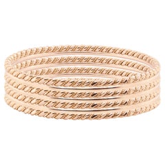 Set di sette braccialetti vintage in corda liscia e ritorta in oro rosa 18 carati