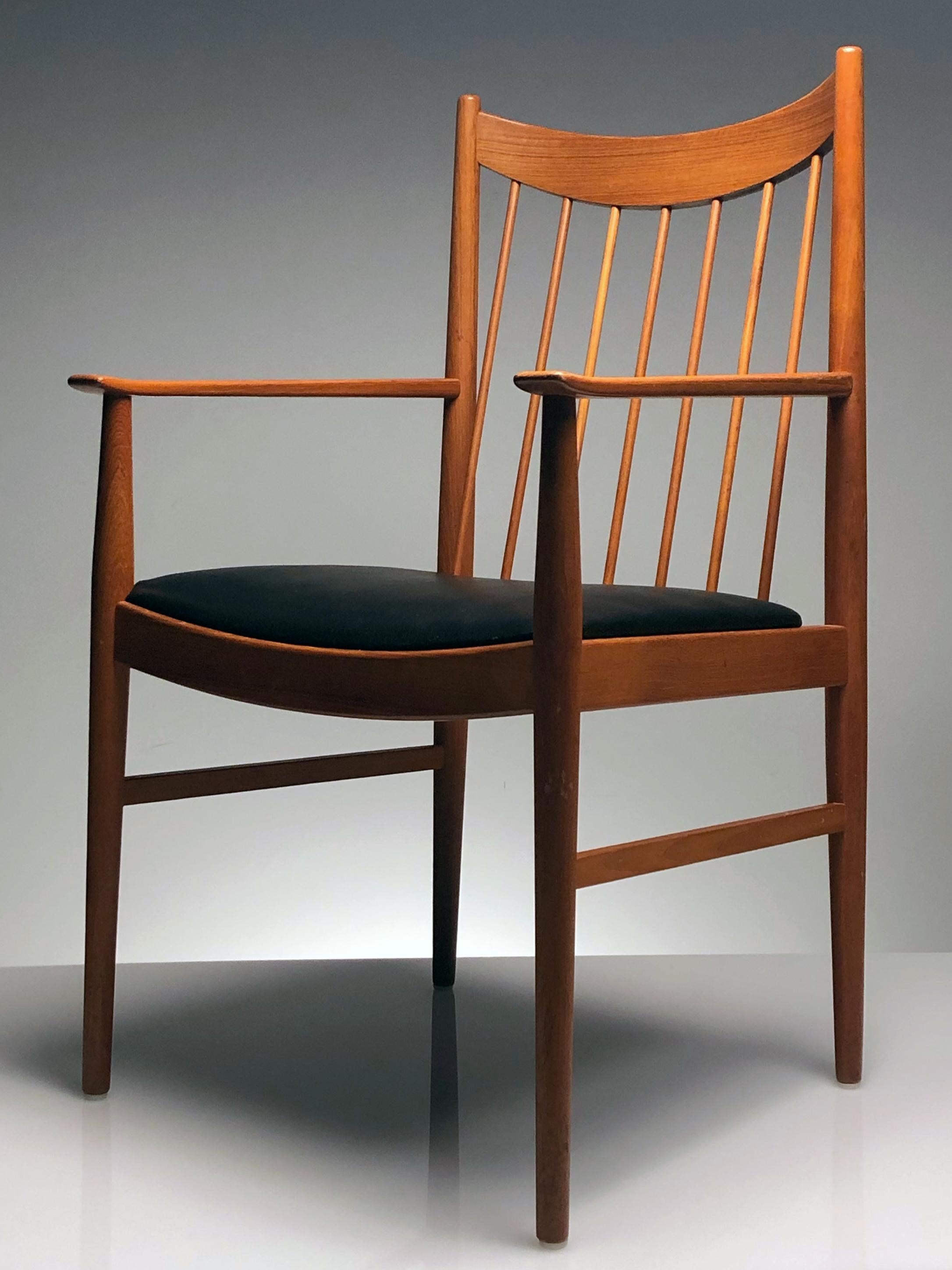 Mid-20th Century Danish Modern Set of Six Plus One Teak Spindle Back Dining Chairs Arne Vodder 