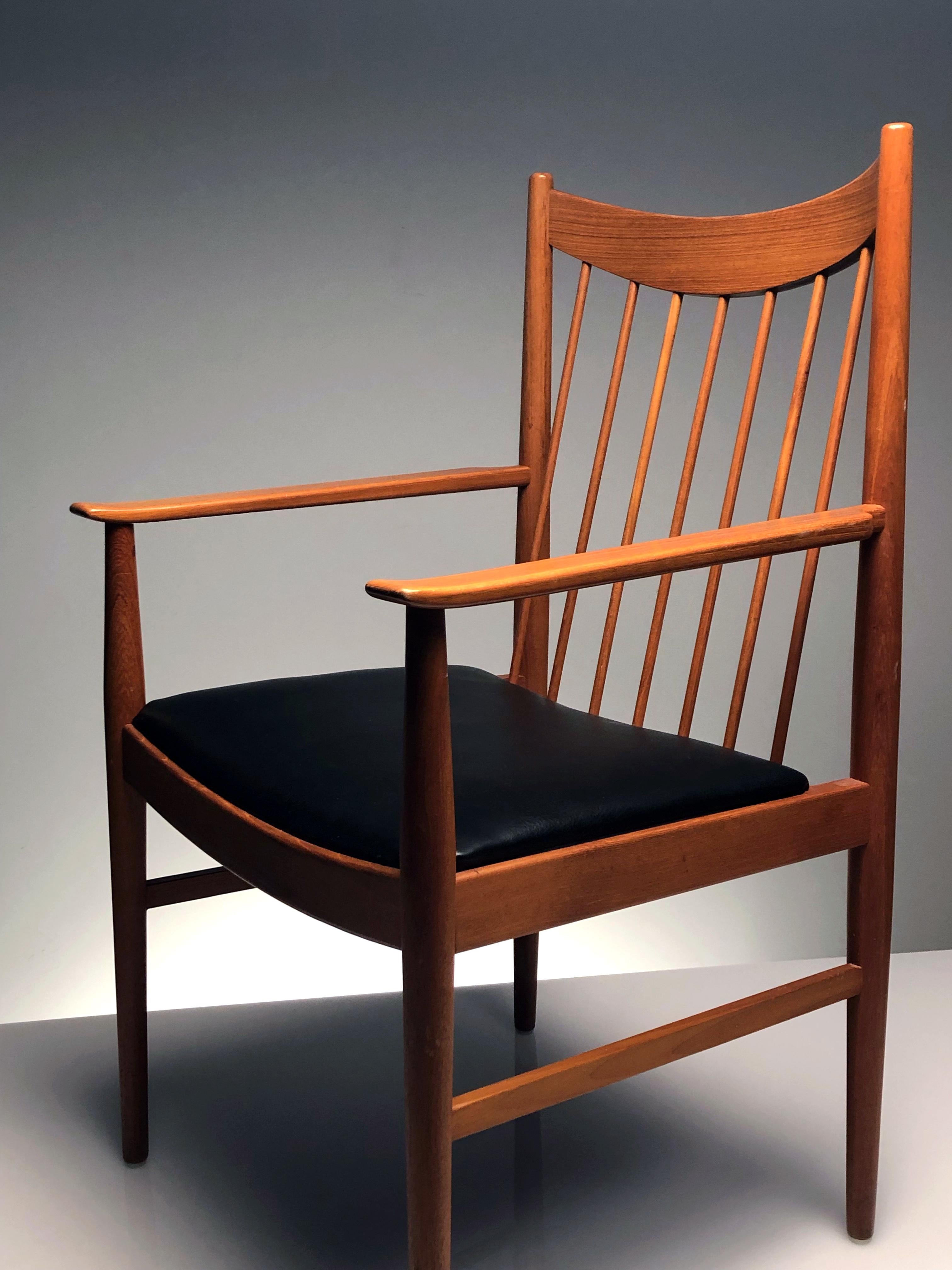Wood Danish Modern Set of Six Plus One Teak Spindle Back Dining Chairs Arne Vodder 