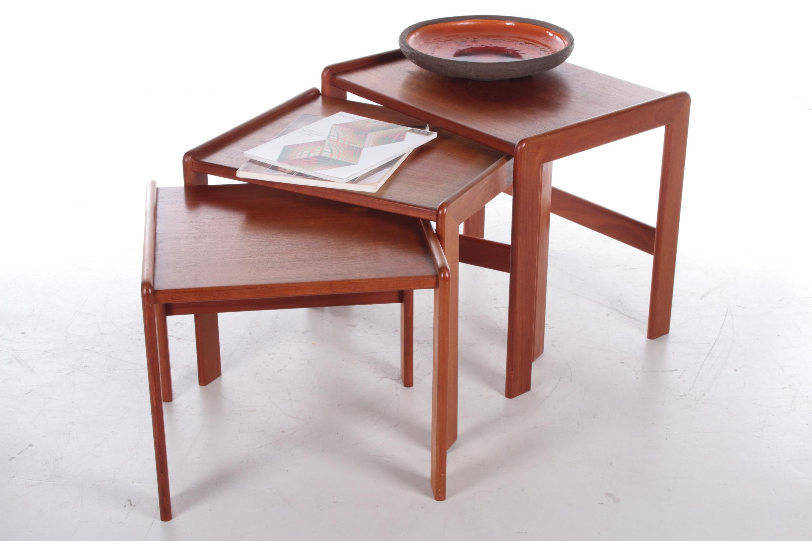 Vintage set of side tables made of teak made in the 1960s


A nice set of 3 side tables.

Made in Scandinavia in the 1960s.

The wood is teak wood on the largest table is a circle.

You could sand and oil the tables and they will look like