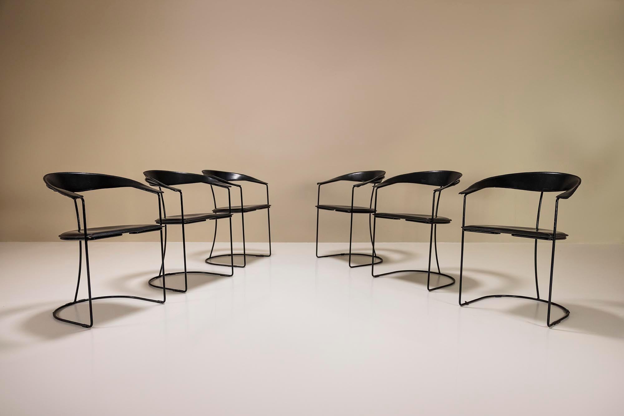 This ‘airy’ set is a perfect example of post-modernistic design. Made by the Italian family company Arrben in the 1980s, who mainly focused on leather furniture products. 

Design
As stated - the chairs have a very light look to it, given the thin