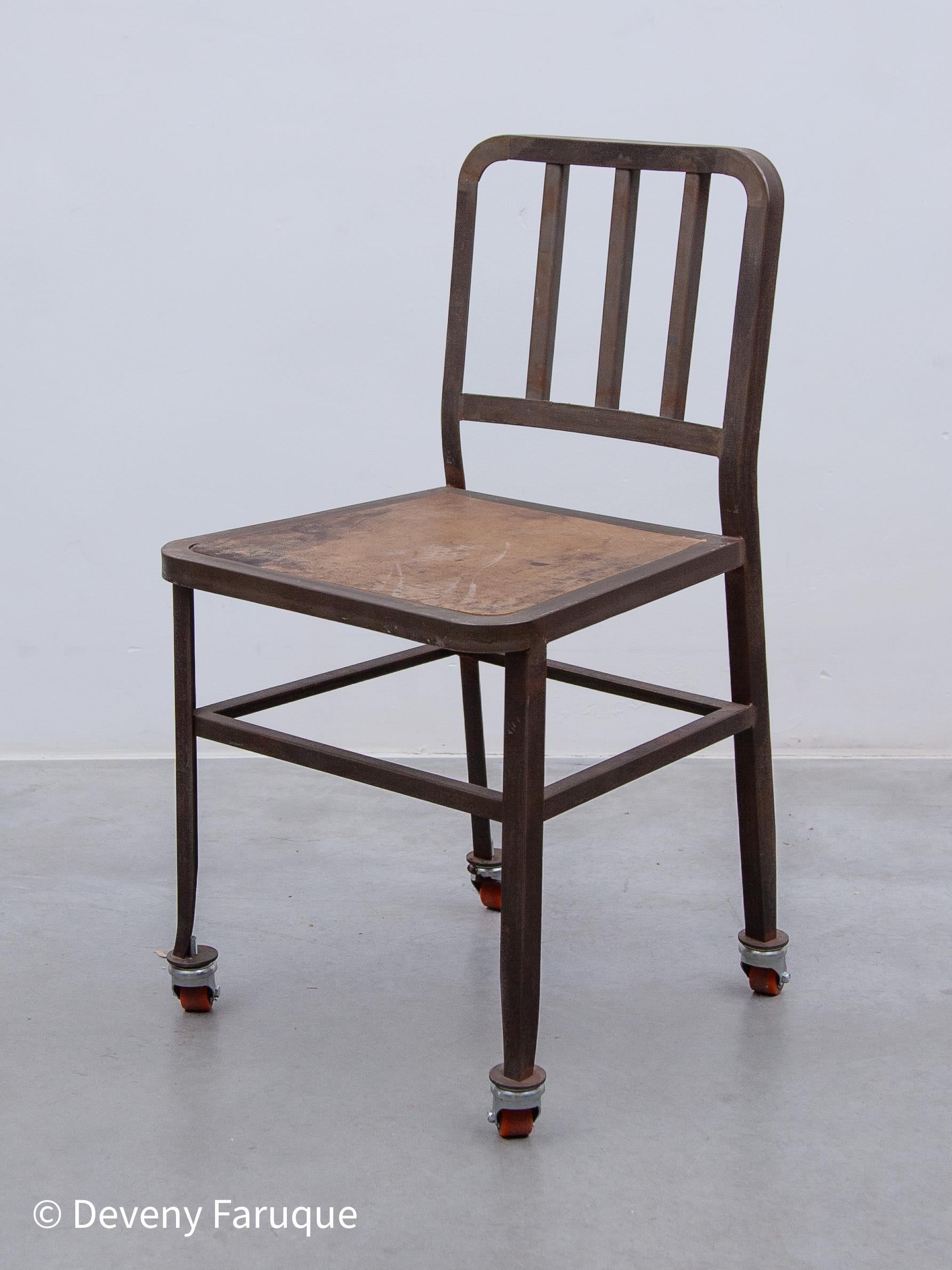 Set of six metal chairs with wooden seats Industrial Navy dining, side chairs based on wheels designed by Emeco, Germany. All chairs in a very good condition, the wood has a nice patina.


Emeco is a privately held company based in Hanover,