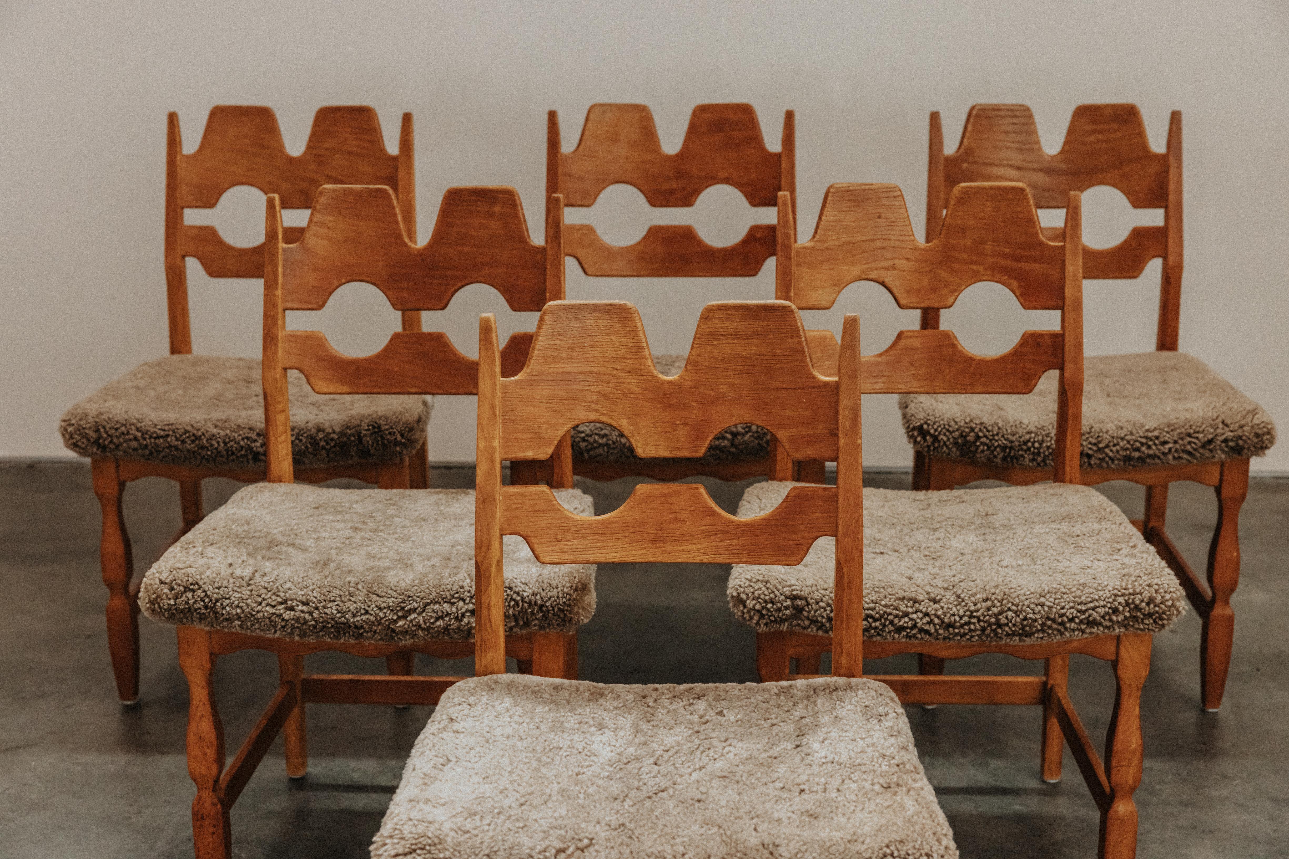Vintage Set of Six Henning Kjaernulf. Razor Dining Chairs From Denmark, 1970s.  Solid oak frame, later upholstered in Denmark with very soft grey, brown shearling.
