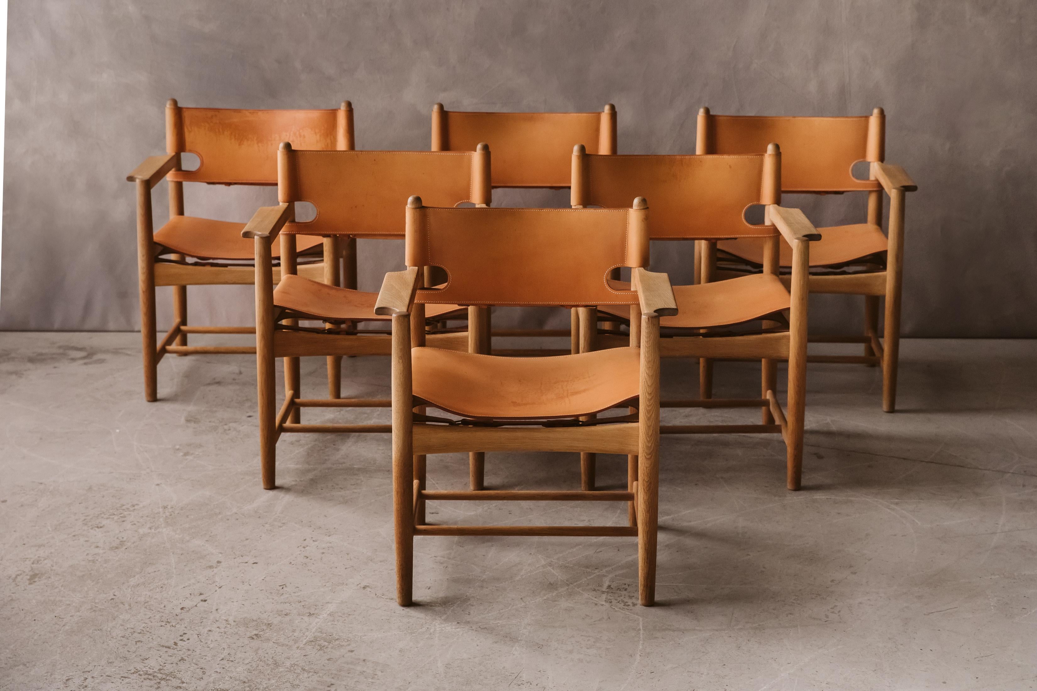 Vintage set of six hunting chairs by Børge Mogensen, Circa 1970. Solid oak construction with thick cognac colored leather. Excellent condition.

We don't have the time to write an extensive description on each of our pieces.
  