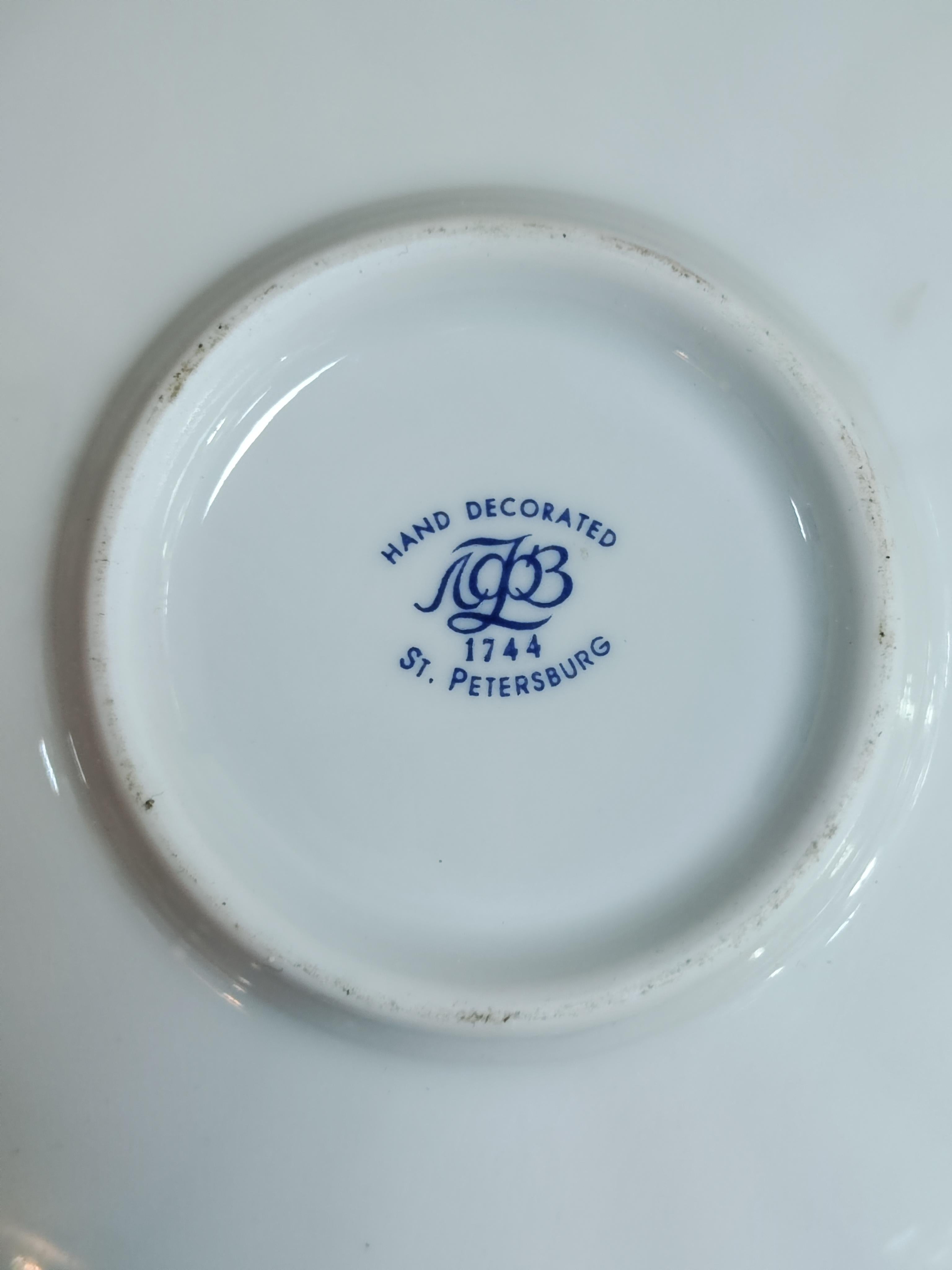 In this listing you will find a set of 6 vintage porcelain tea cups with saucers, manufactured by Russian Imperial Porcelain manufacturer Lomonosov. Tea Cups are hand decorated with Bluebells. Made in USSR in 1960s.

Excellent condition with no