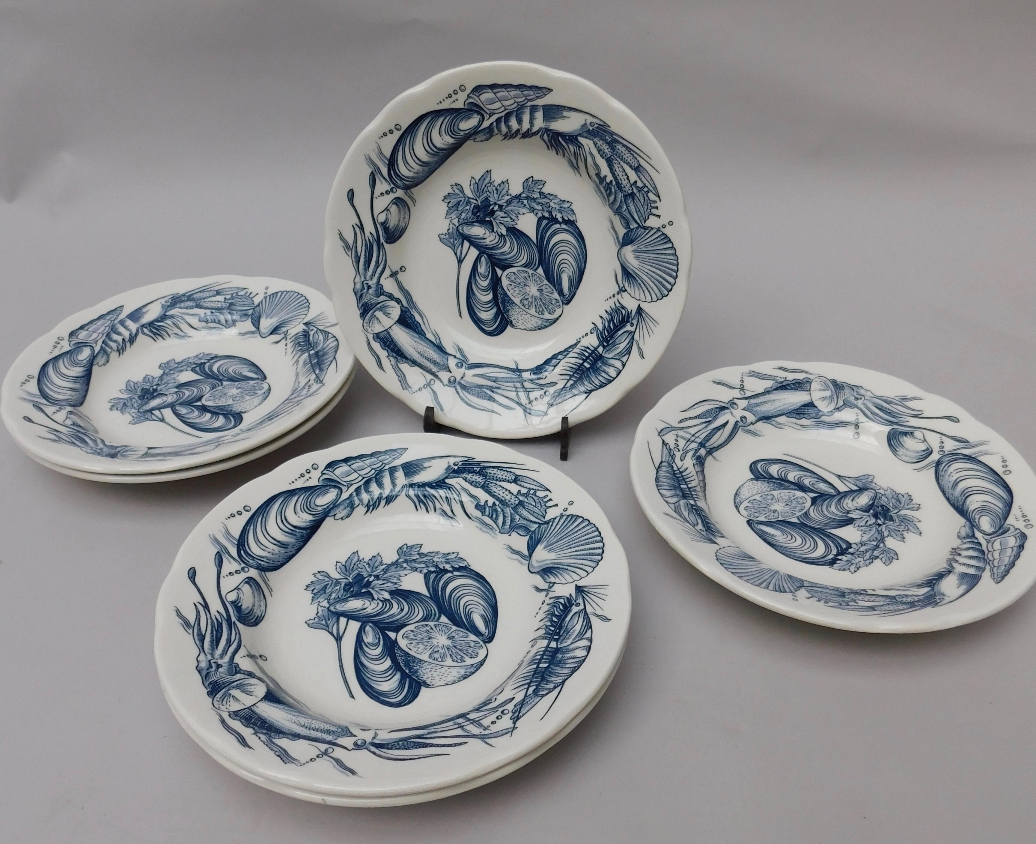 A set of six vintage English ironstone soup bowls with glazed transfer design of shellfish. All in excellent condition, circa 1970.