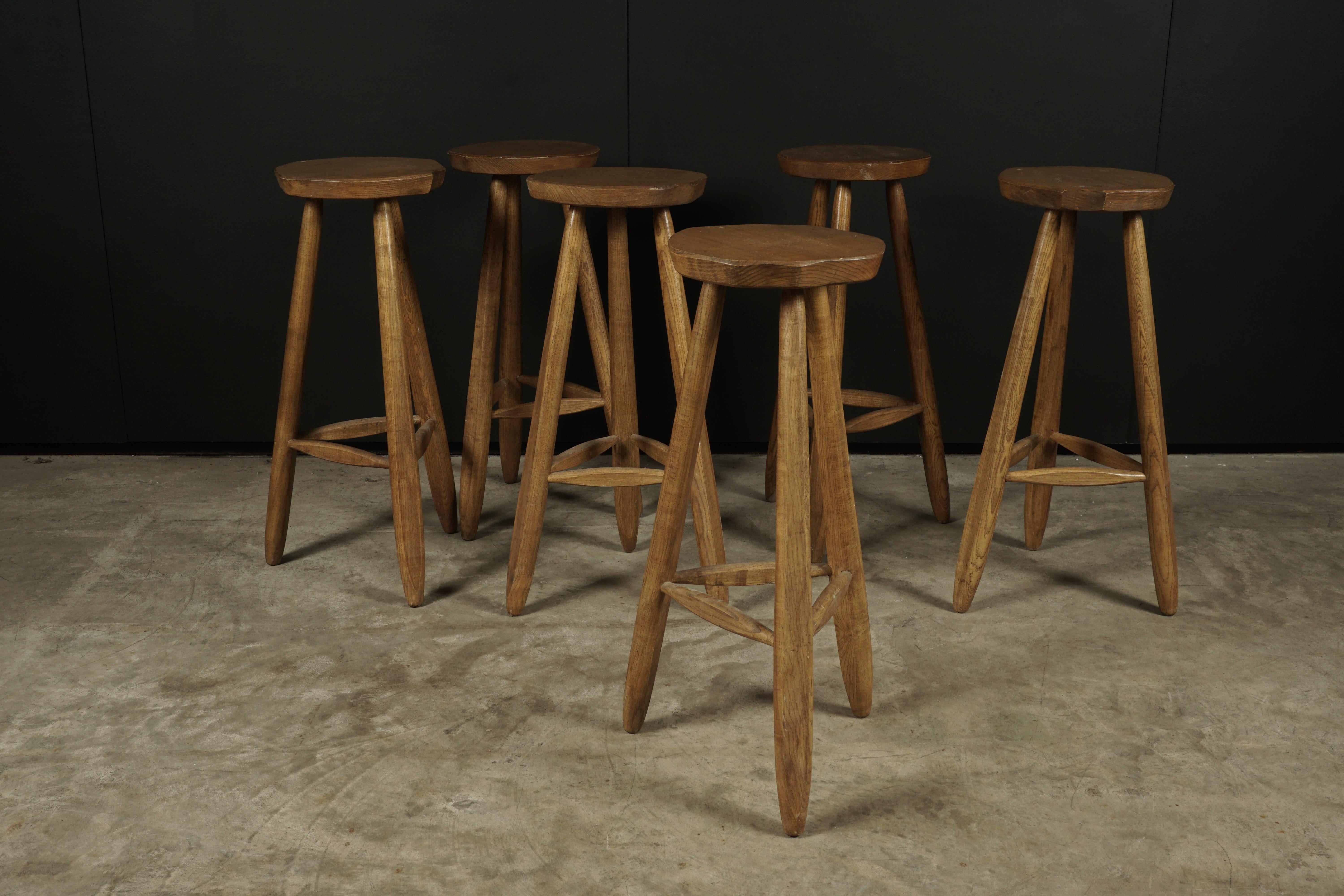 Vintage set of six oak barstools from France, 1970s. Solid oak construction with light wear and patina.
