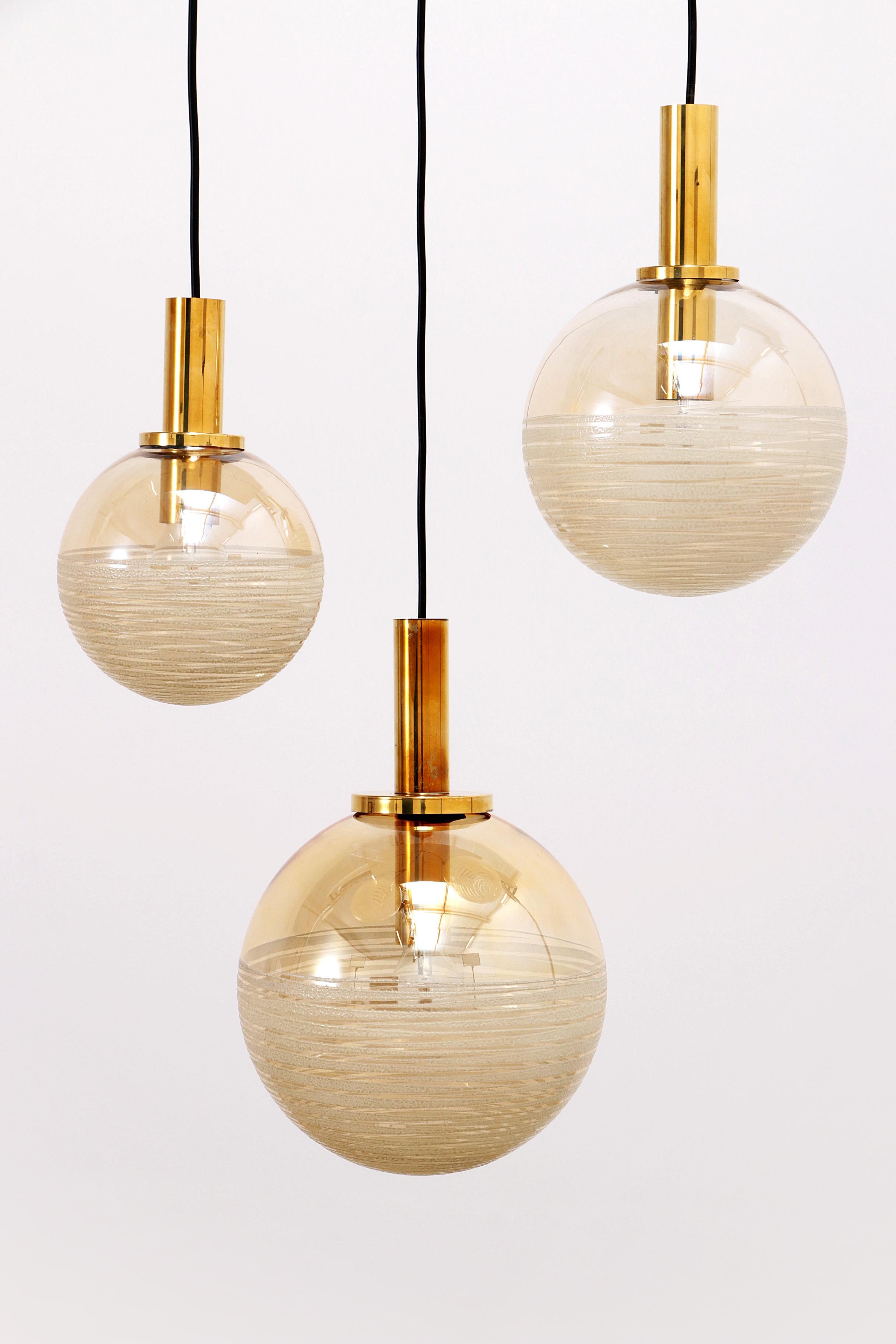 Mid-Century Modern Vintage Set of three Glashutte Limburg hanging lamps, 1960s Germany. For Sale