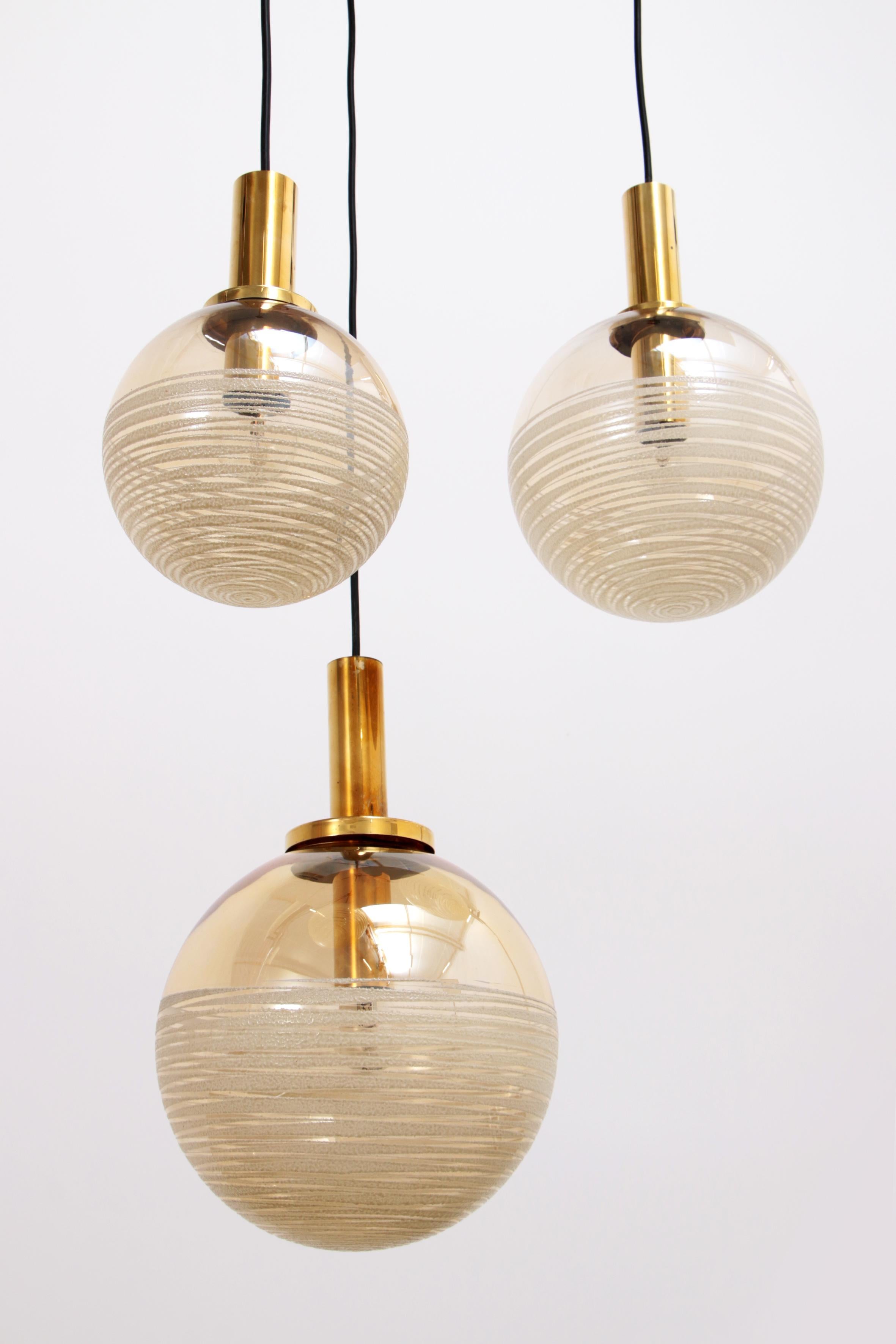 Brass Vintage Set of three Glashutte Limburg hanging lamps, 1960s Germany. For Sale