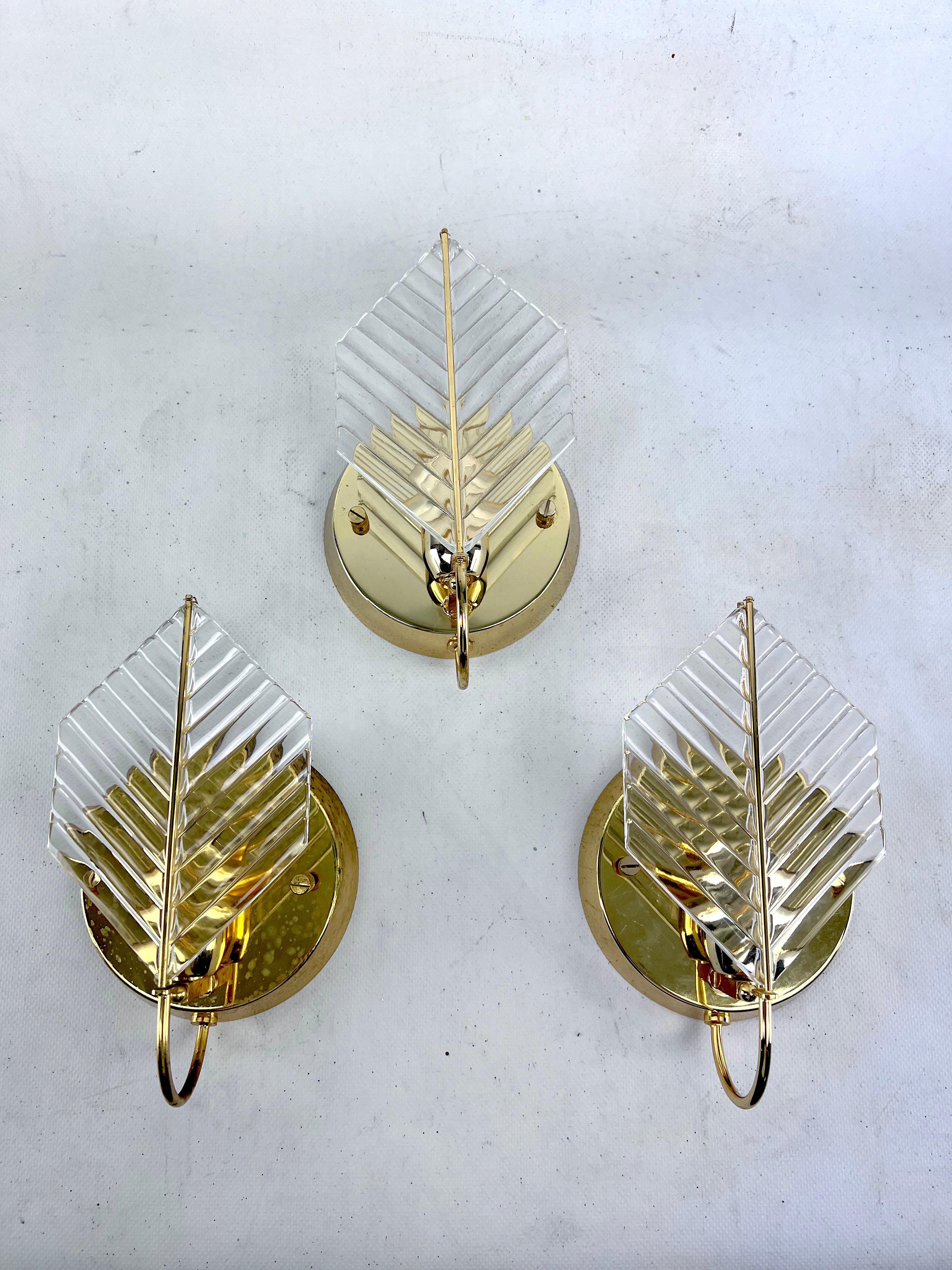 Brass Vintage set of three sconces in brass and glass by Zero Quattro. Italy 1970s For Sale