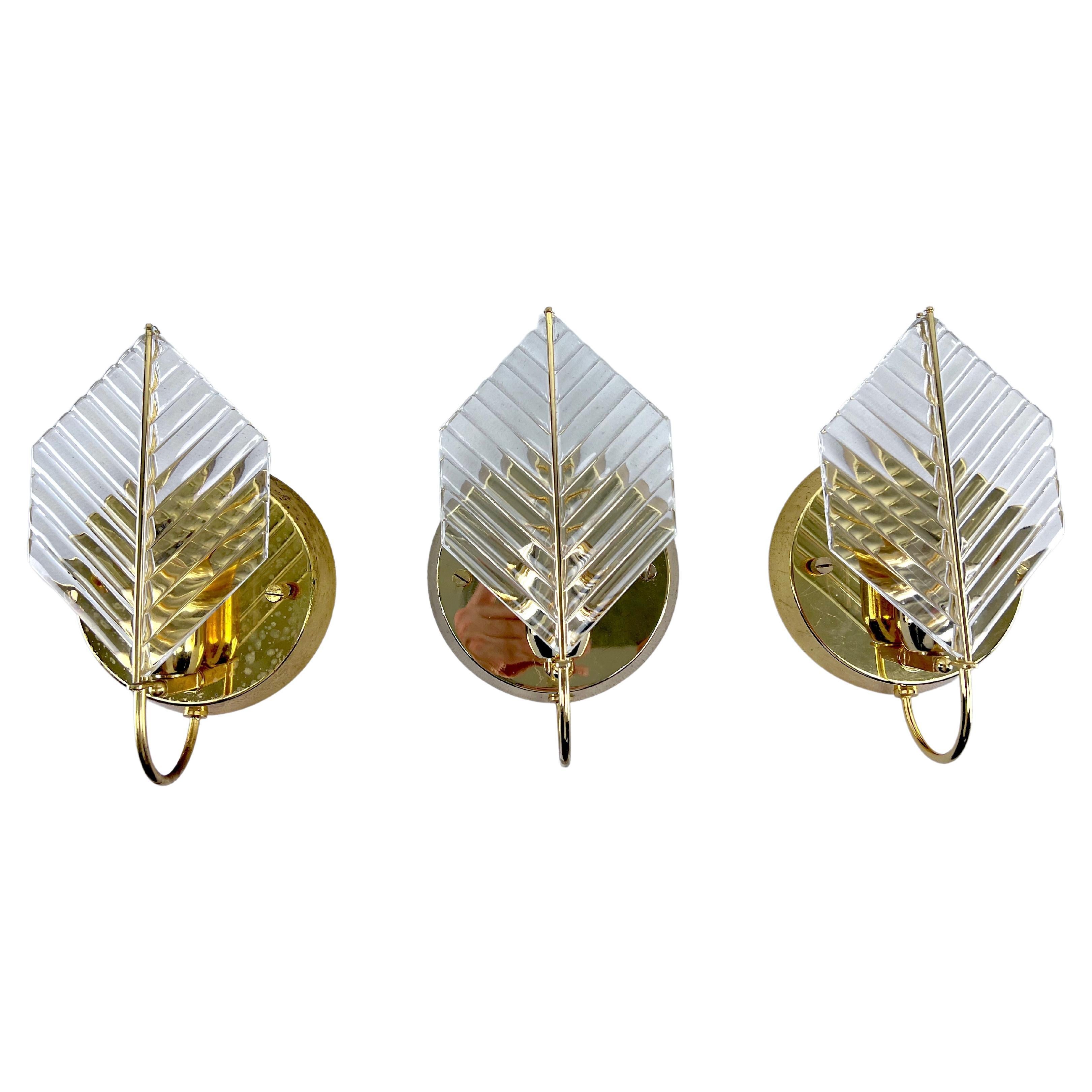 Vintage set of three sconces in brass and glass by Zero Quattro. Italy 1970s For Sale