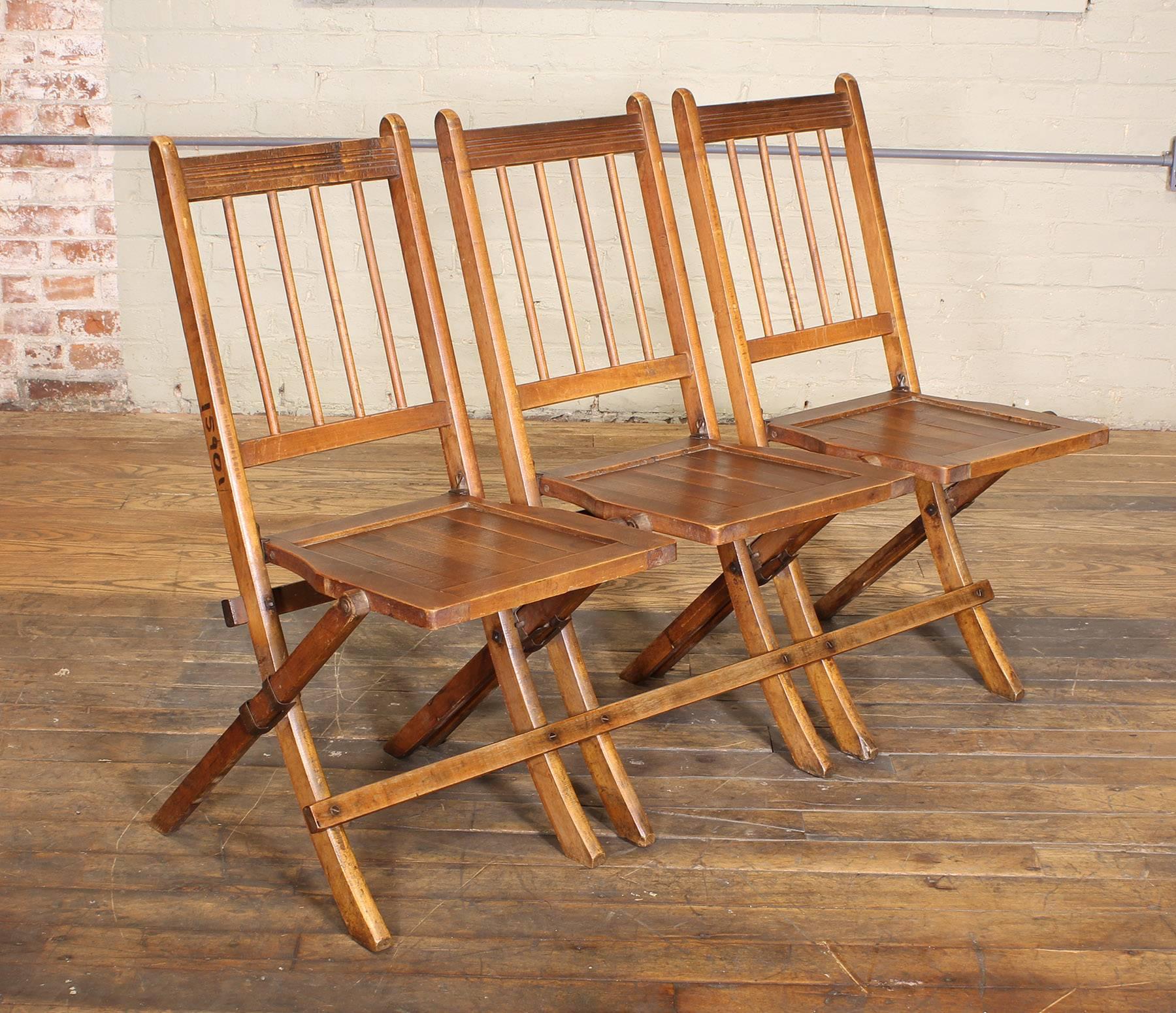 Vintage set of three wooden tandem stadium fold-up seats, chairs, bench. Measures: 48 1/2
