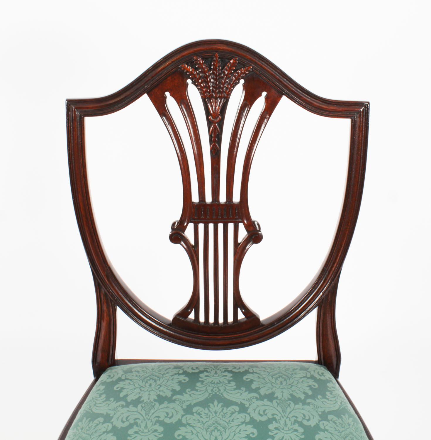 Mogano Set vintage di sette sedie da pranzo Wheatsheaf Shieldback del XX secolo in vendita