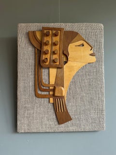 Vintage seventies wallhanging in wood and burlap