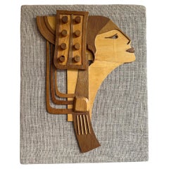 Vintage seventies wallhanging in wood and burlap